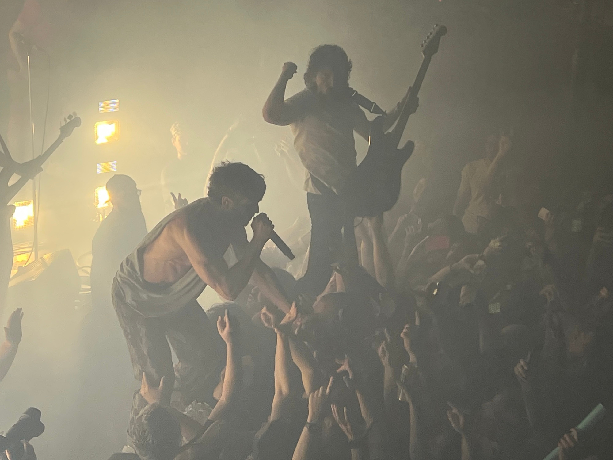 The Armed singer and guitar player crowdsurfing 