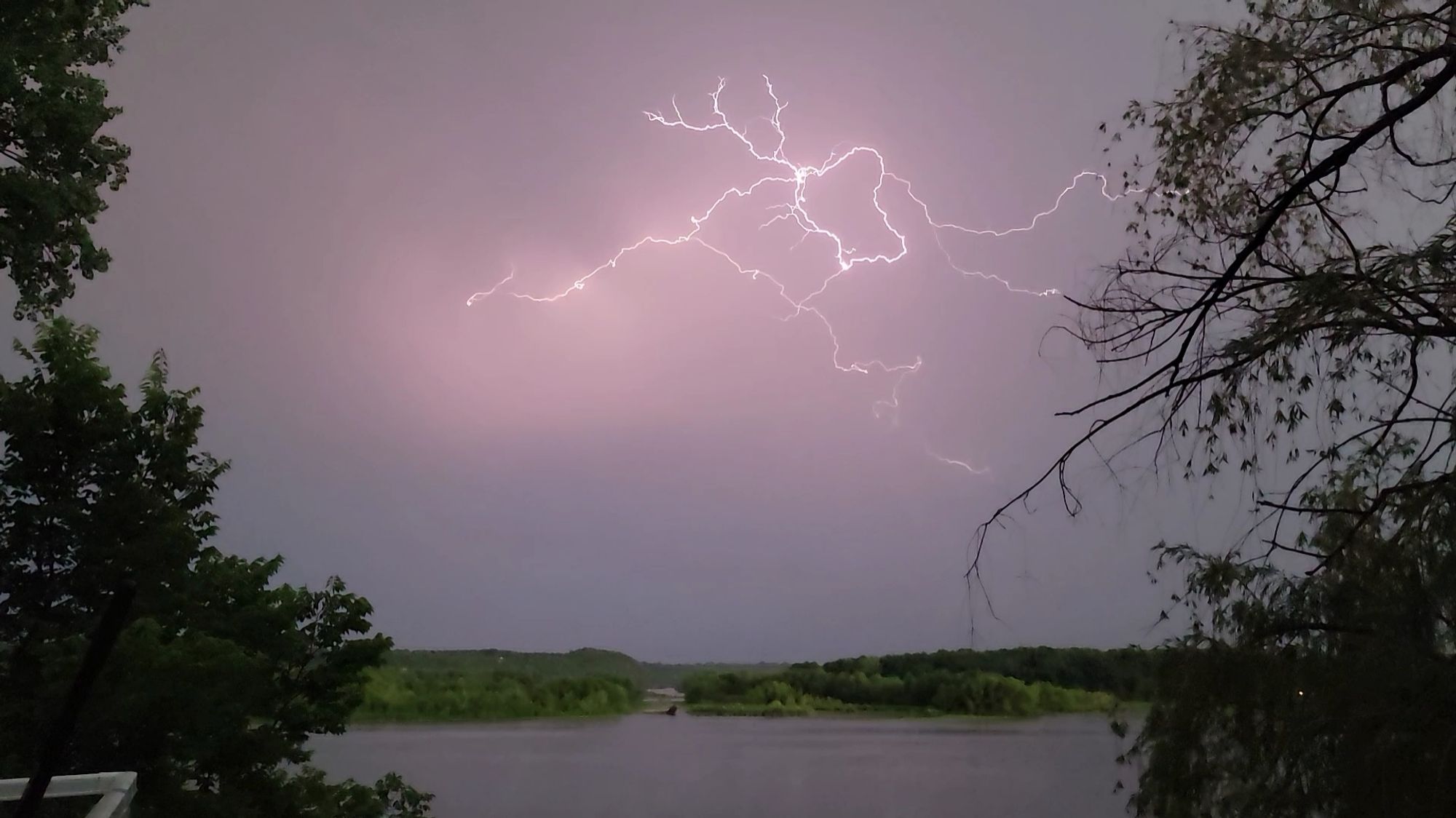 Lightning dances over the backwaters of the Mississippi River.