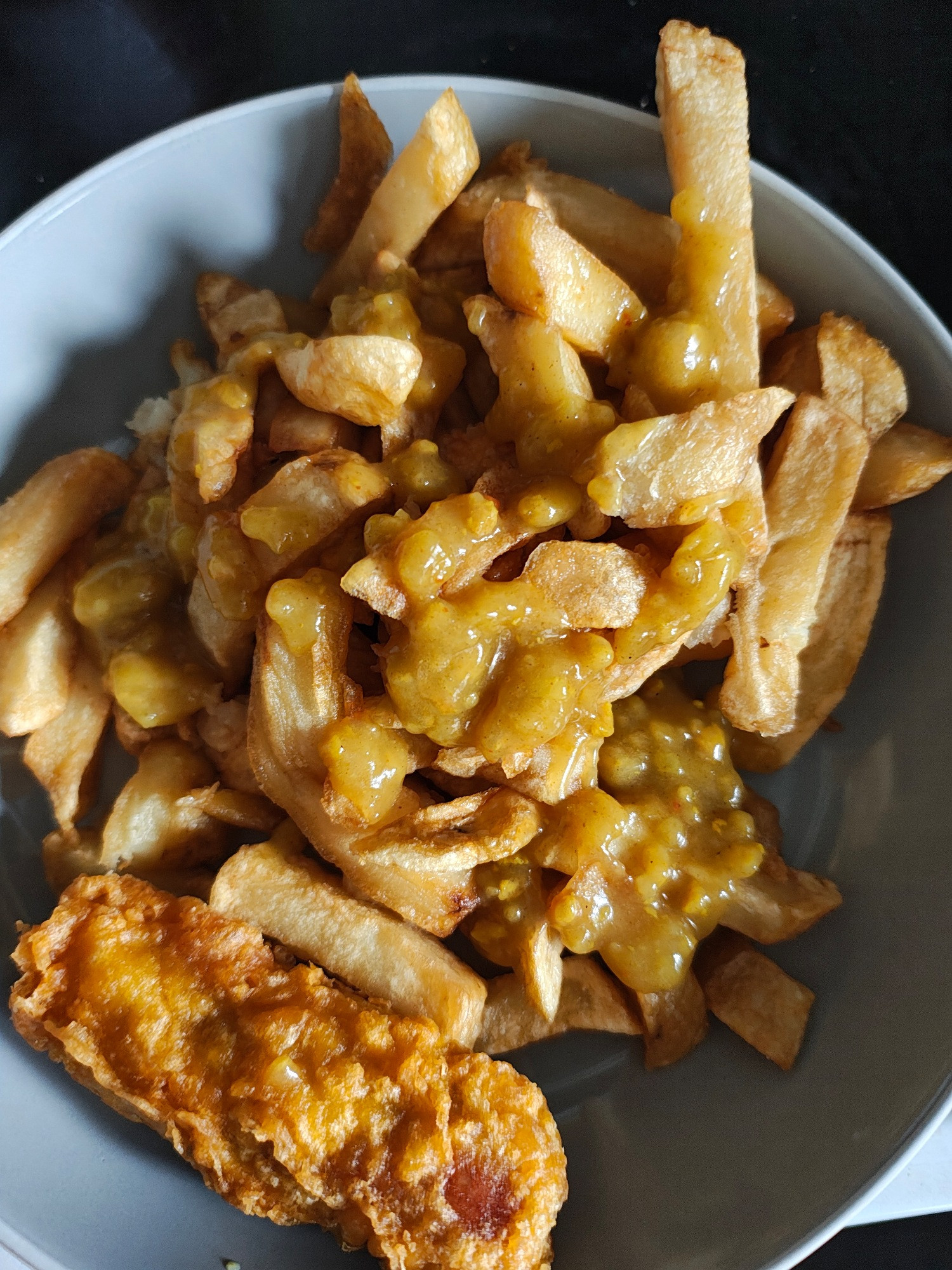 Battered sausage, chips, curry sauce