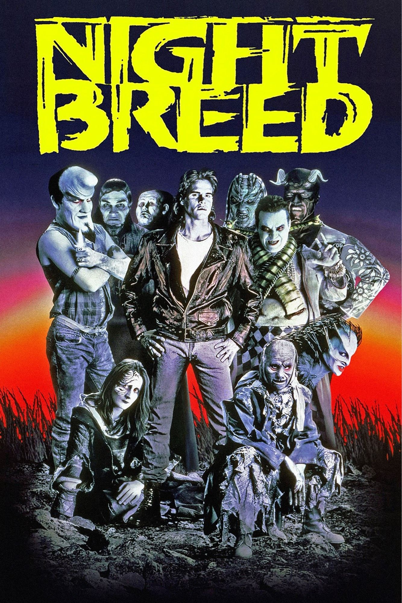 Nightbreed movie poster. A bunch of weirdo characters in front a sunset.