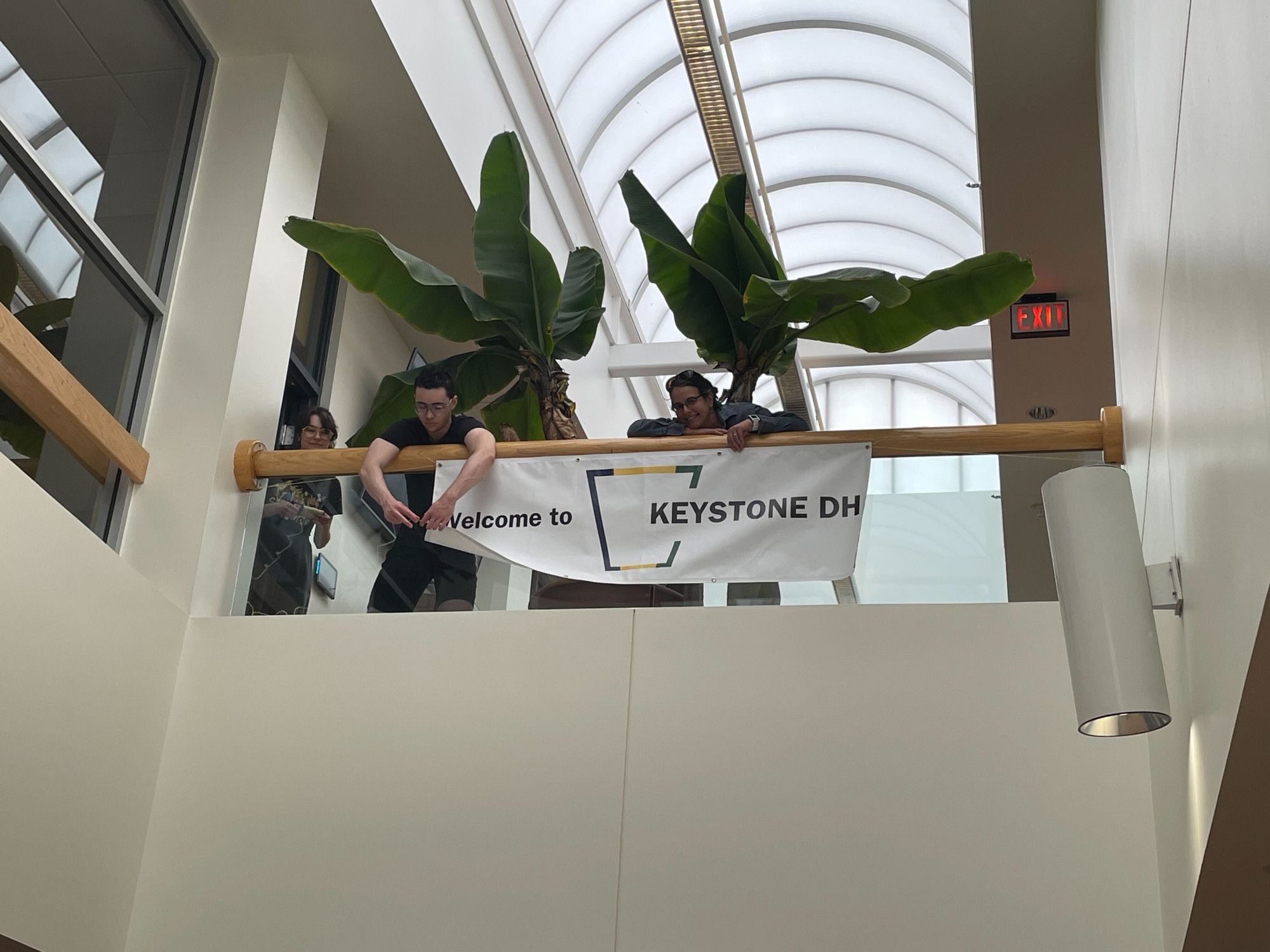 The conference support team unfurls our welcome banner for Keystone DH!