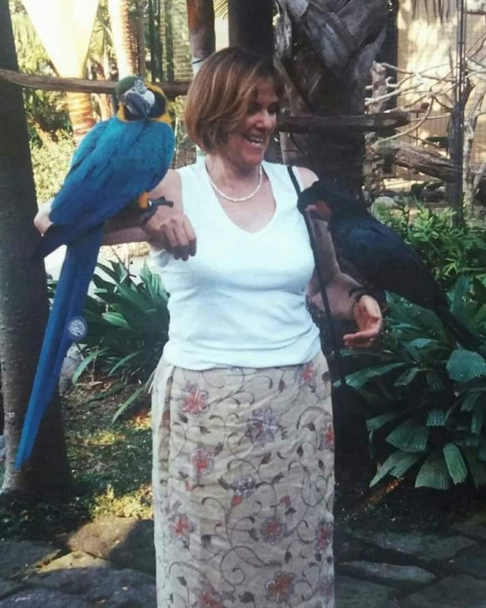 Mum in Bali with a macaw and another doubtless non-native bird. Early 2000s.