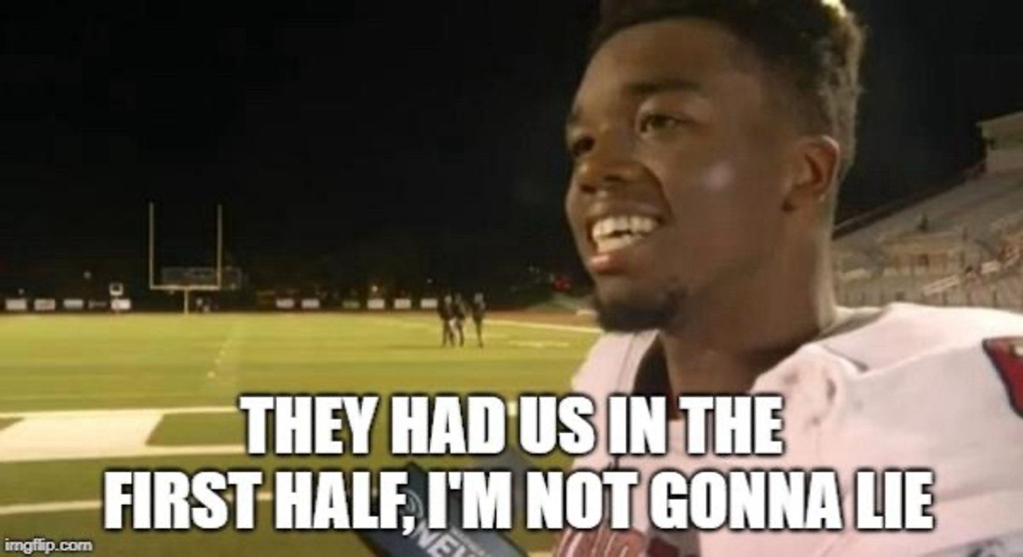 Photo of young black American footballer in an interview saying “They had us in the first half, I’m not gonna lie”