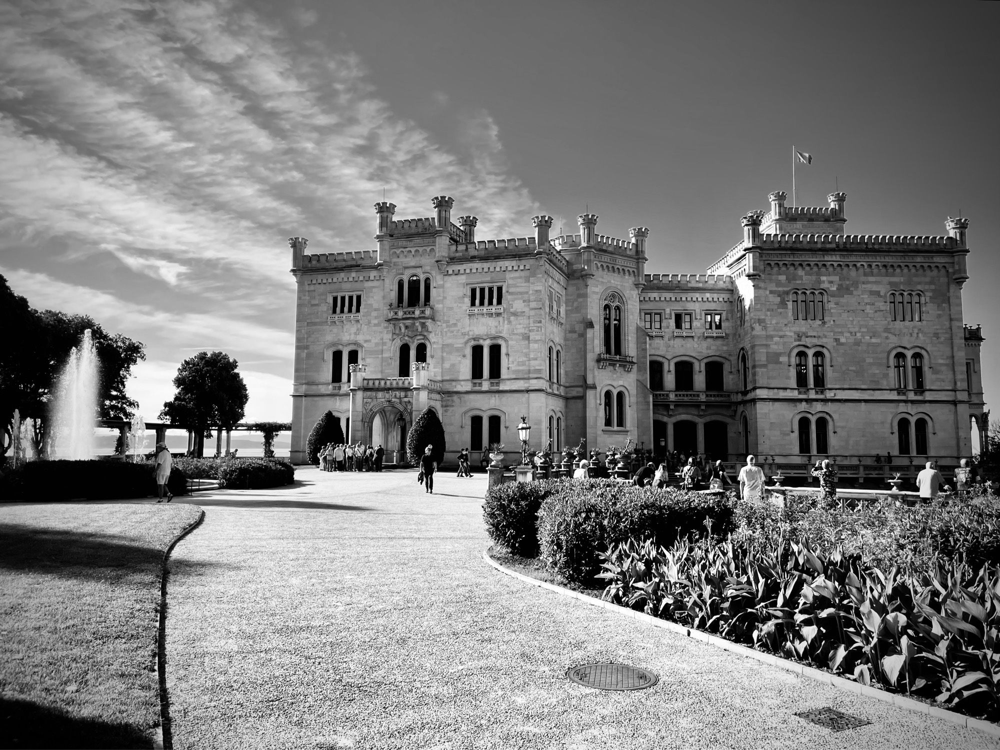 Miramare castle facade with a fountain.  Italianate in style which I guess it would be.