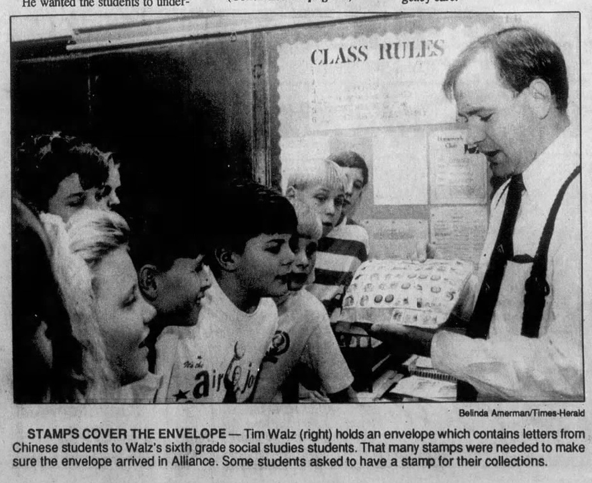 TIC Wall UY SIUM 10 UE

esse z ‘ Belinda inacinaniiirnae tora
STAMPS COVER THE ENVELOPE — Tim Walz (right) holds an envelope which contains letters from

Chinese students to Walz's sixth grade social studies students. That many stamps were needed to make
sure the envelope arrived in Alliance. Some students asked to have a stamp for their collections.