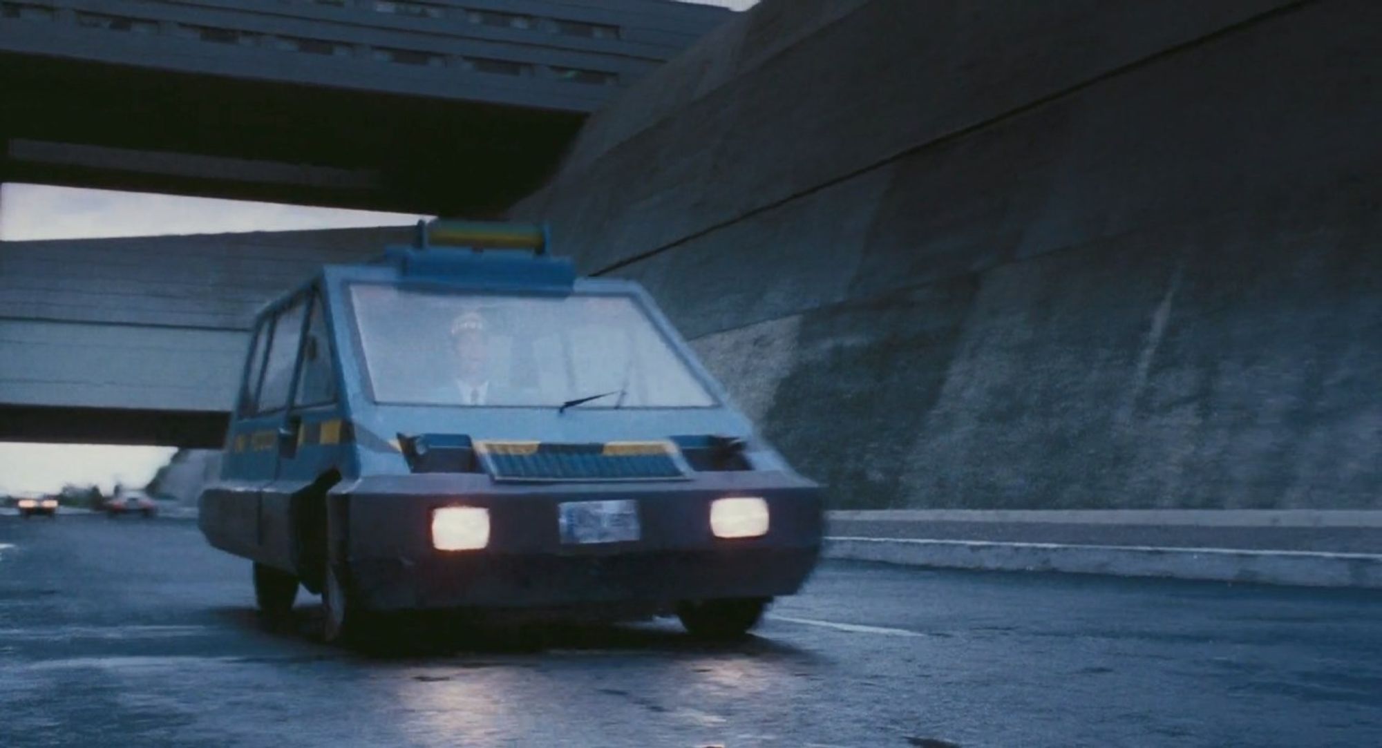 A still imageof a Johnny Taxi from Total Recall (1990).