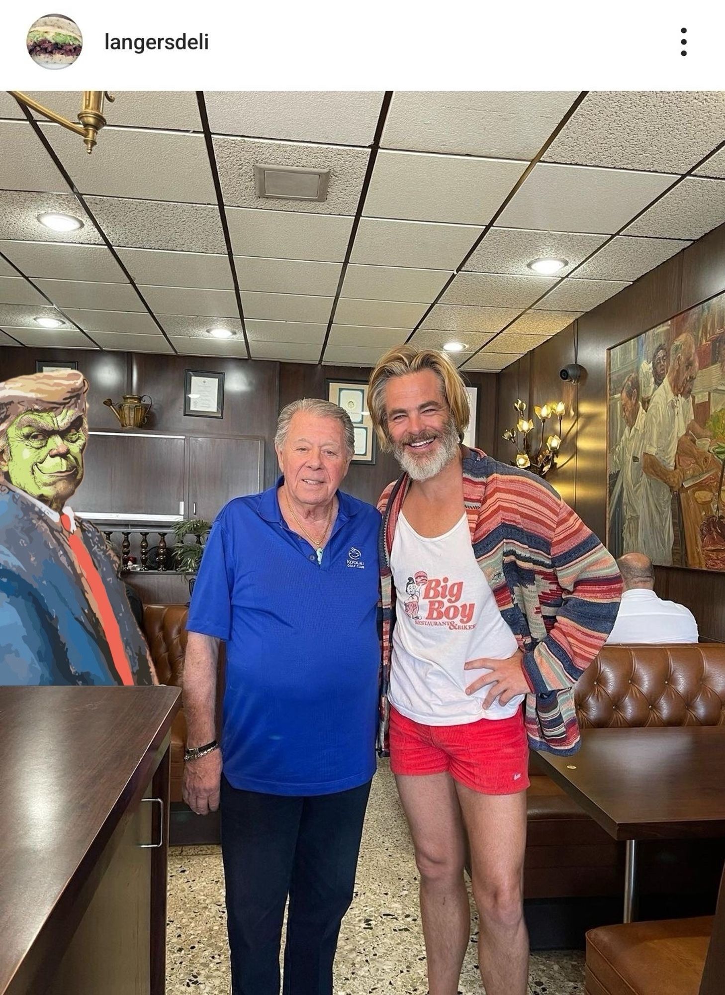 Grinch Donald Trump photo bombing femboy Chris Pine.