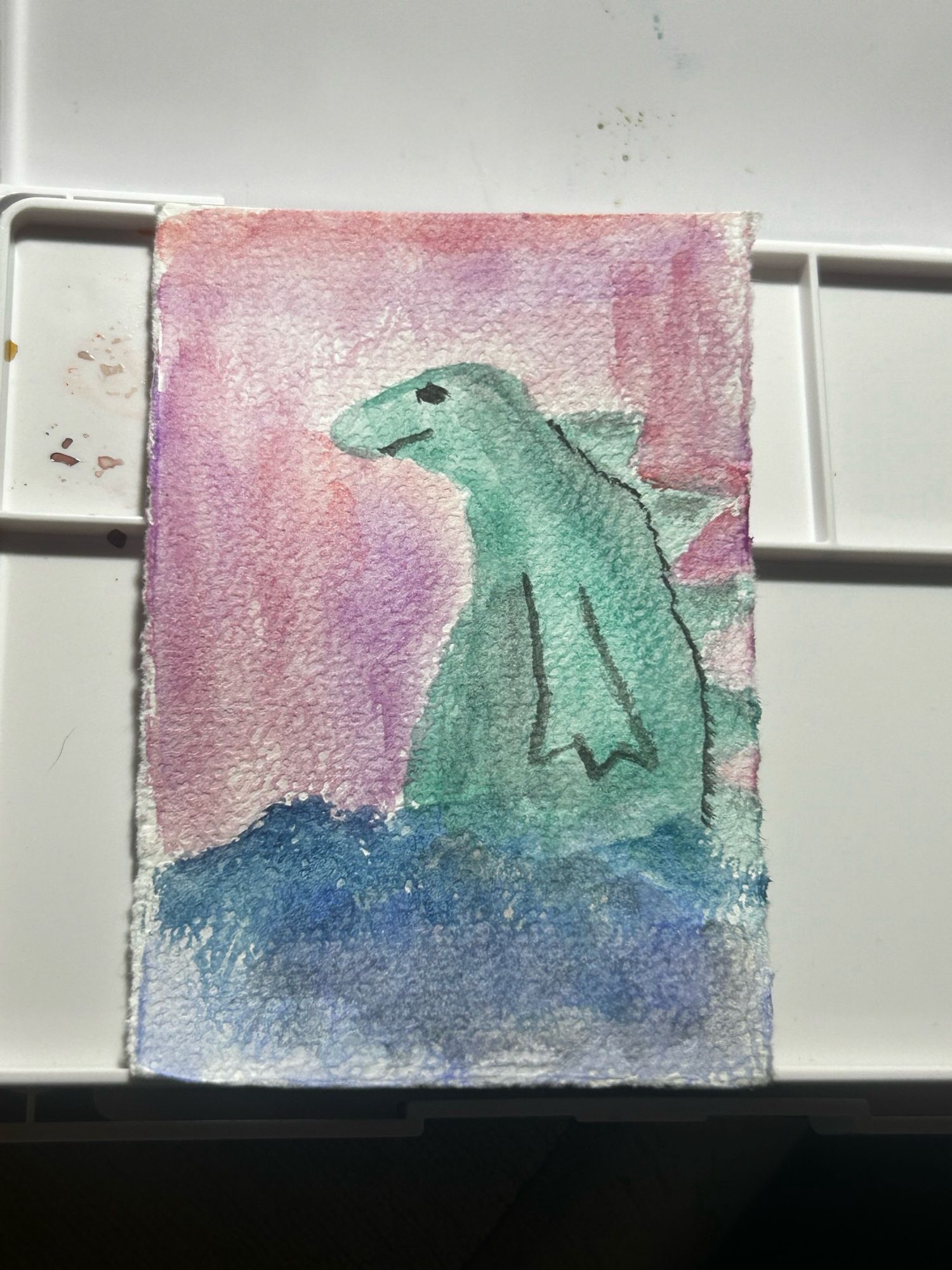 a watercolor painting of godzilla coming out of the water