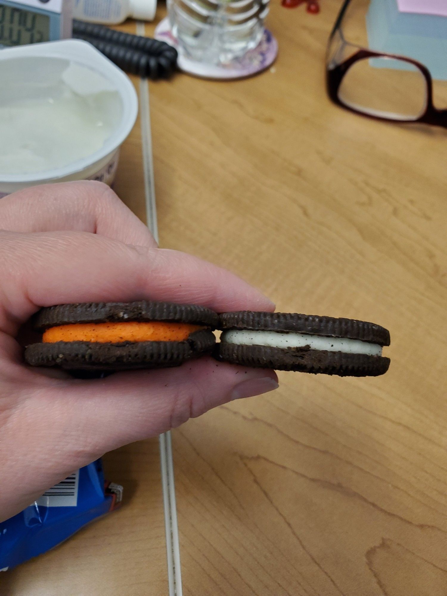 Orange cream Halloween oreo next to a double stuf, showing its the same!