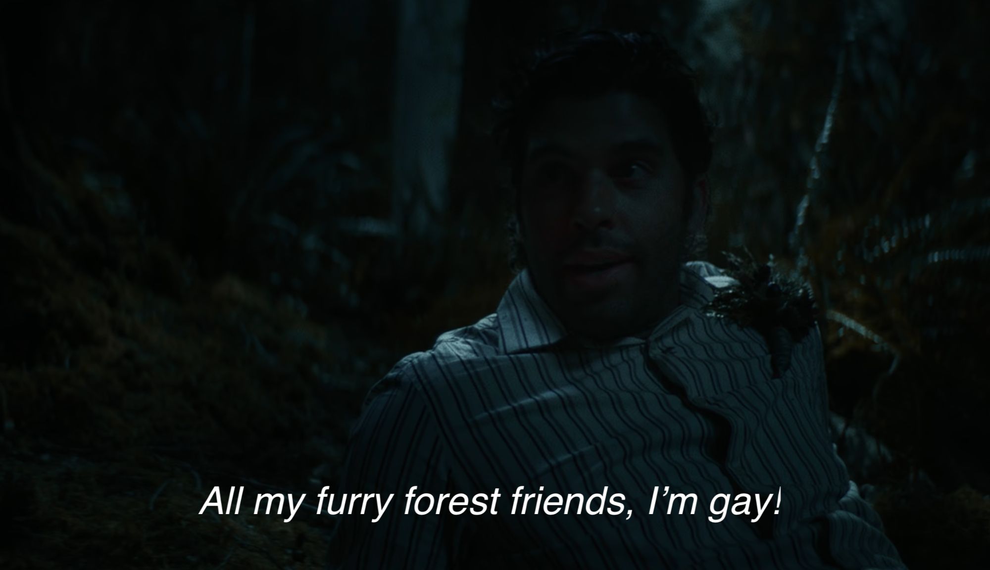 Screenshot from Yellowjackets where Coach Ben yells, "All my furry forest friends, I'm gay!"