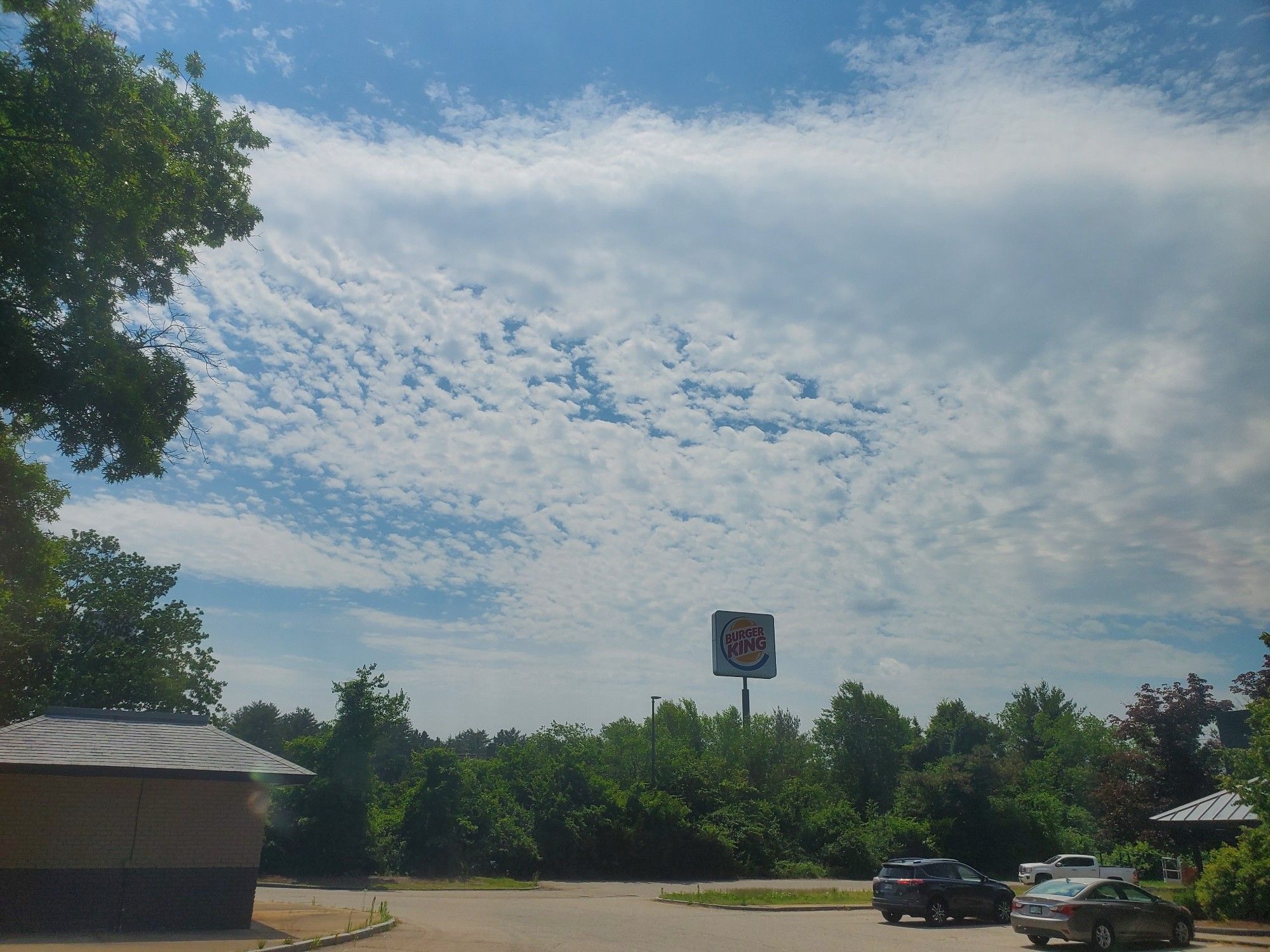 Burger King sign and clouds