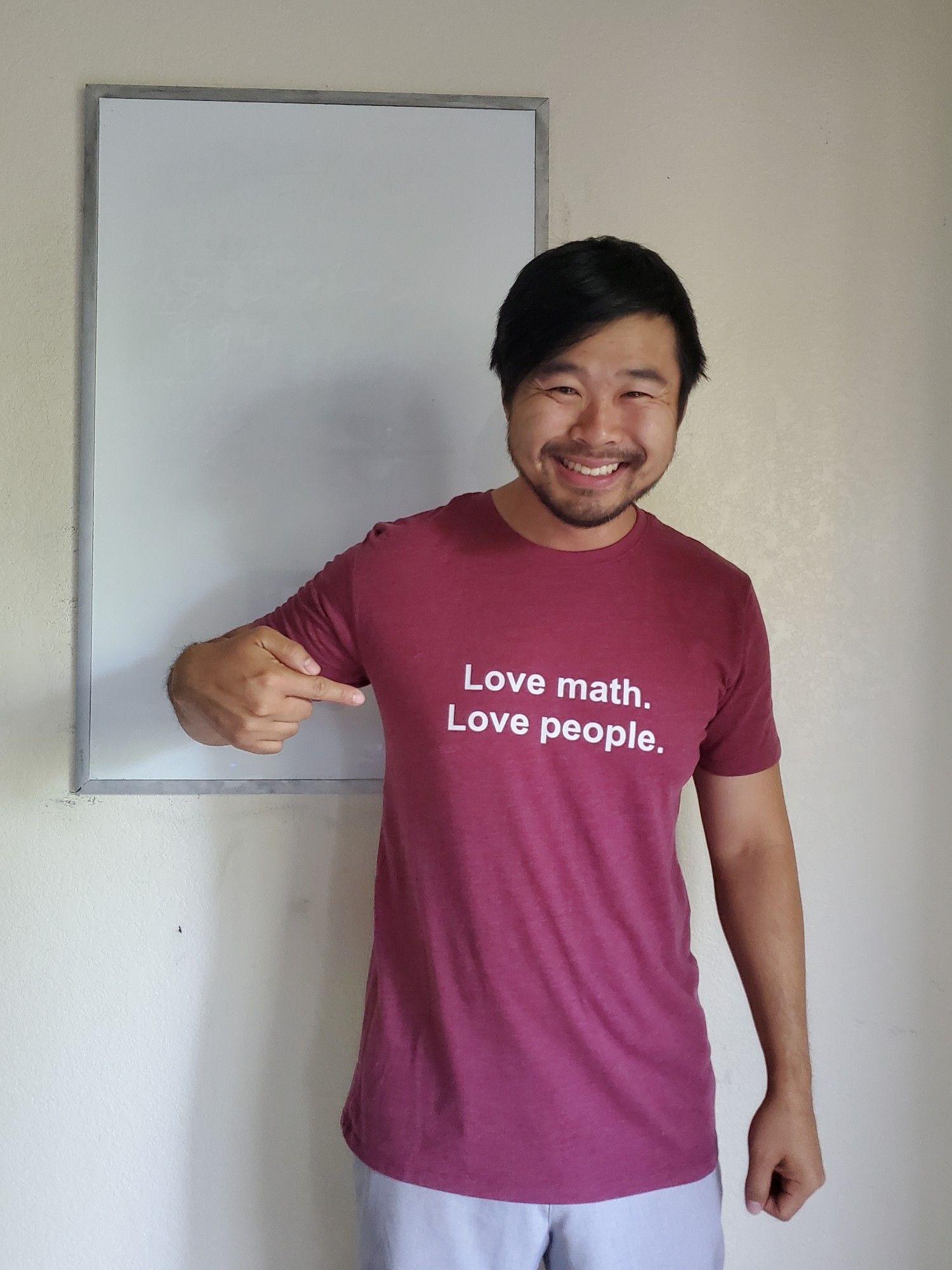 A picture of me with a shirt that says "Love math. Love people."