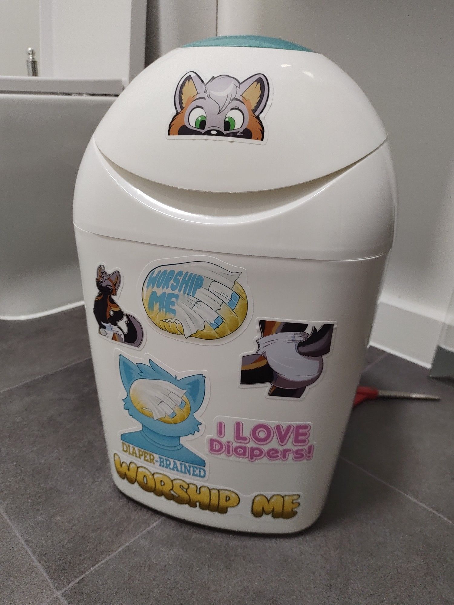 My diaper pail with stickers.