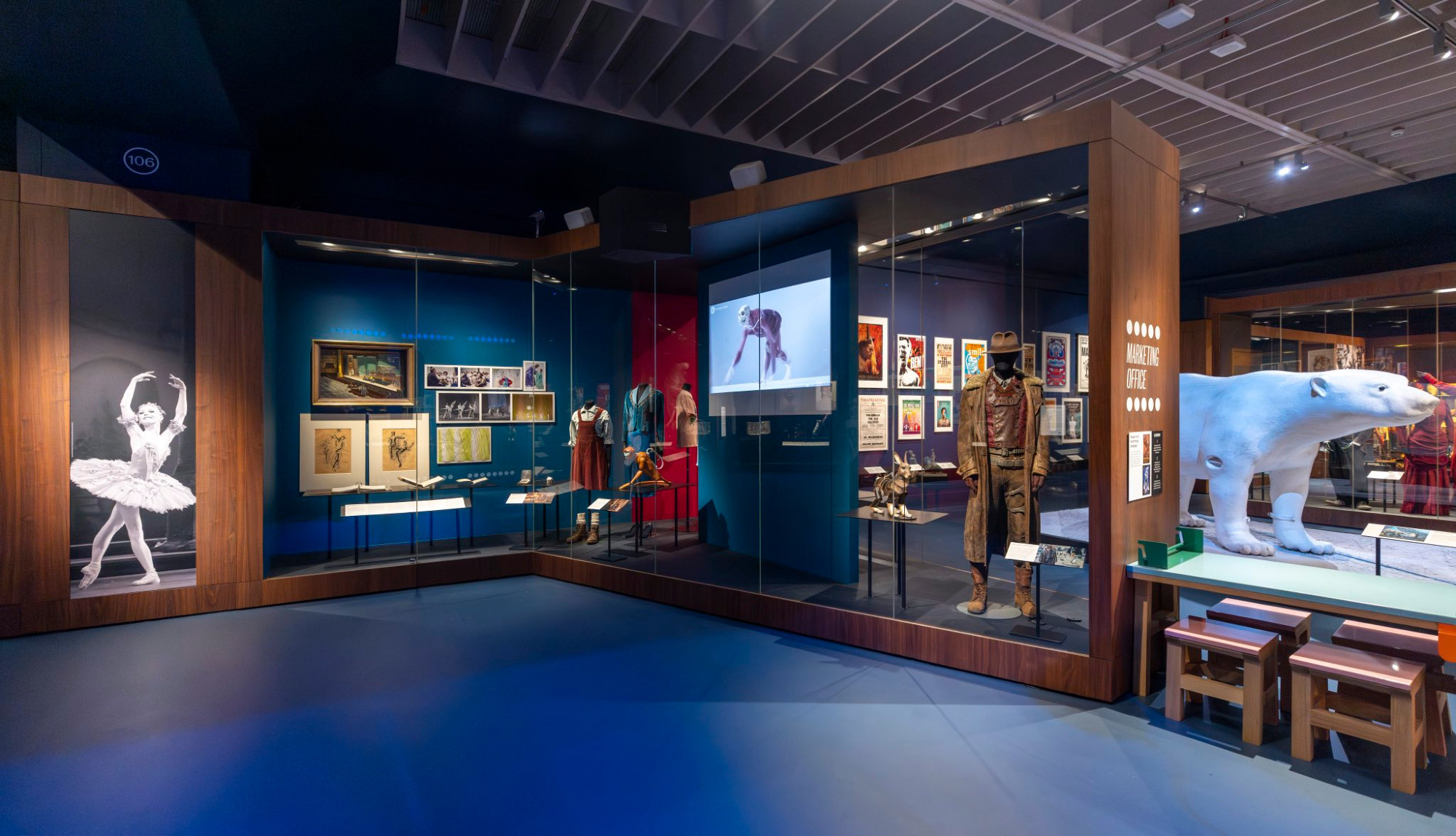 A view from the Theatre & Performance Gallery at The Victoria and Albert Museum (London), featuring many items from the HIS DARK MATERIALS TV-show production, including a scale-1 Iorek mock-up, costumes from Lee Scoresby, Lyra and Mrs Coulter, a lovely Hester puppet and many other treasures