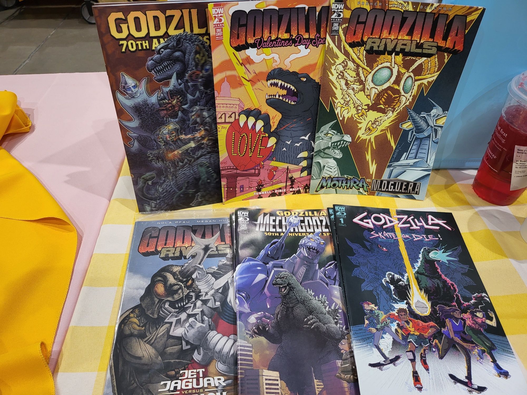 Copies of the Godzilla 70th lenticular cover, Godzilla Valentine's Special, Rivals: Mothra vs. M.O.G.U.E.R.A., Rivals: Jet Jaguar vs. Megalon, the Mechagodzilla 50th Anniversary Special, and Skate or Die #1.