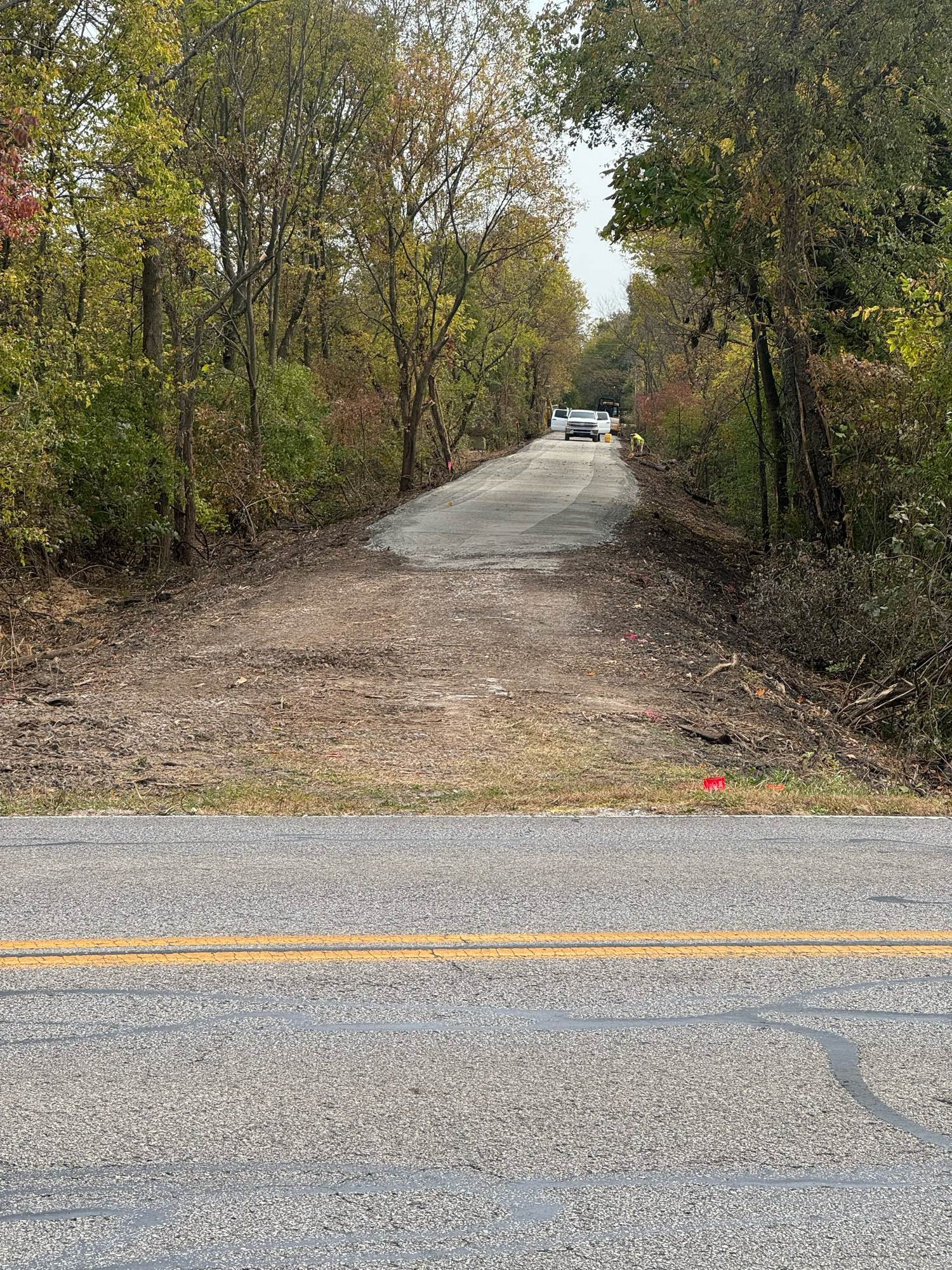 Photo shows grading and packed gravel at Hendricks County B&O Trail’s new extension that heads east from the current trailhead at Raceway Rd.  By end of 2025 this extension will connect to Speedway’s Trail - just 3 miles to the east.  