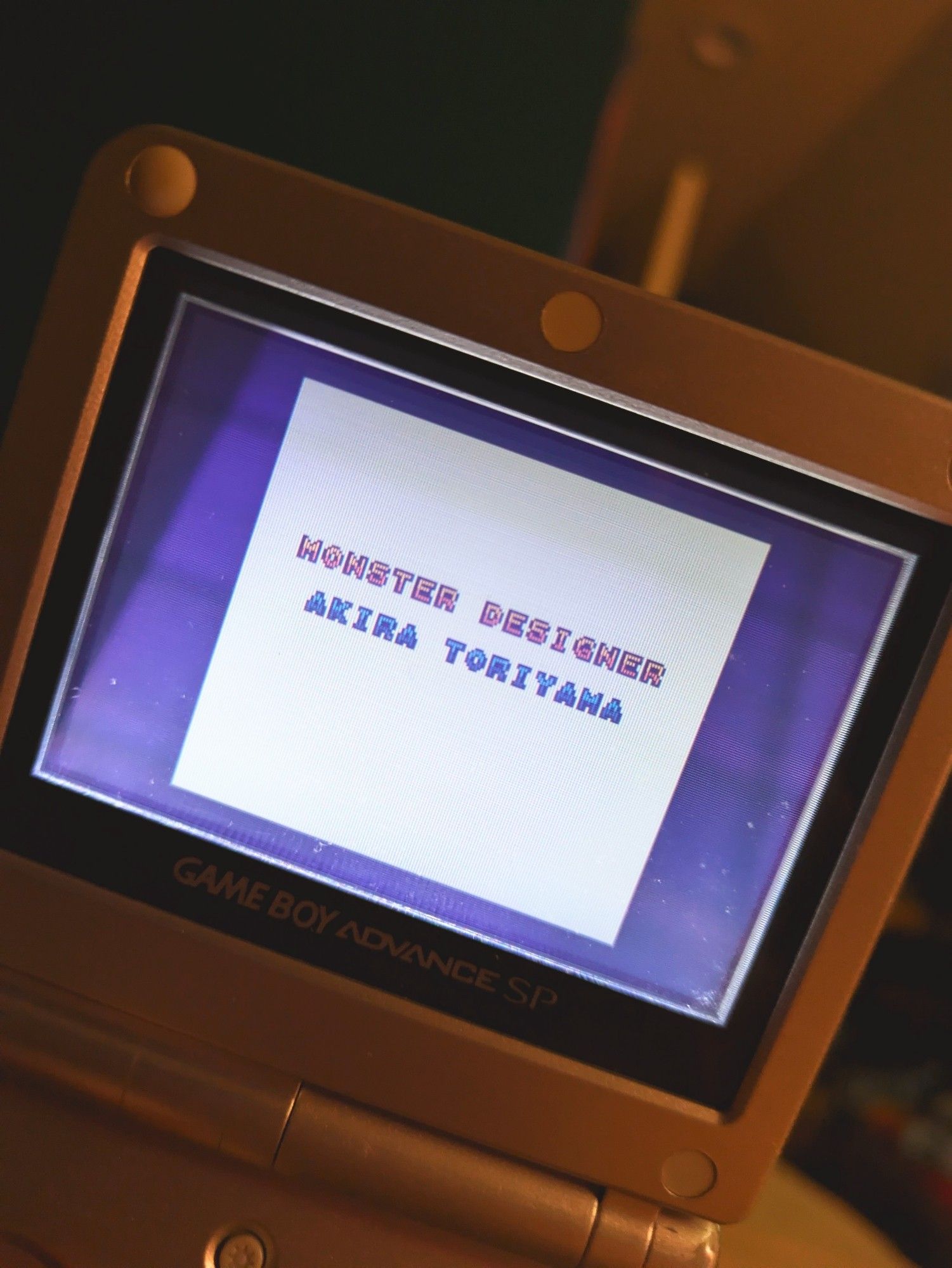 The credits for Dragon Quest 1 (Dragon Warrior 1&2) on a Game Boy Advance SP. Monster Designer Akira Toriyama shown.