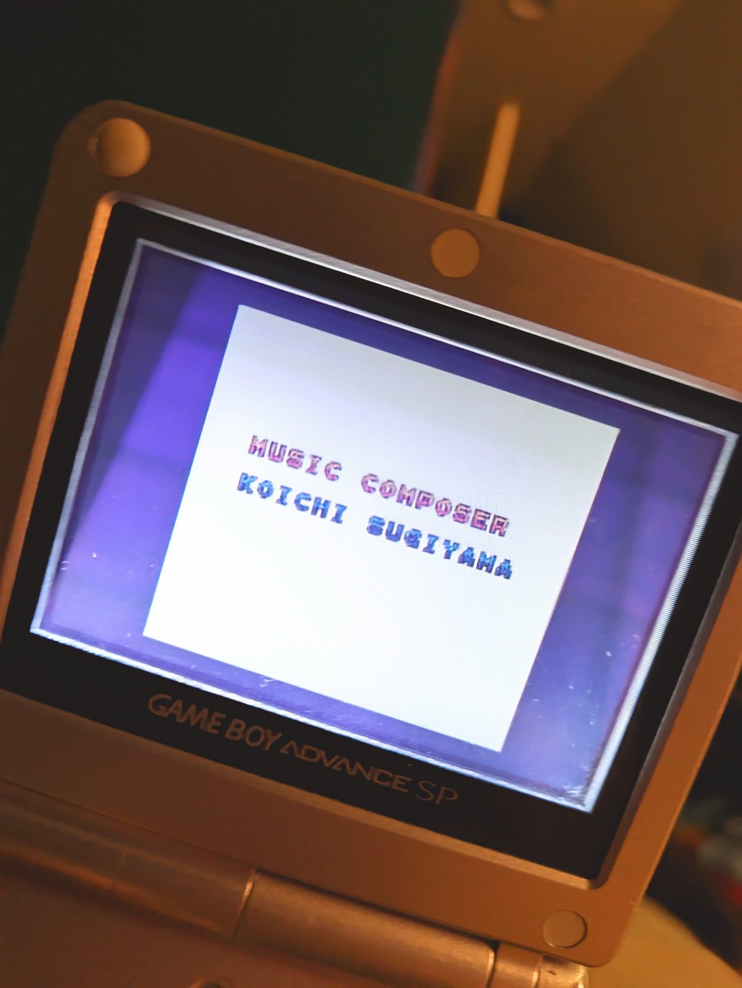 The credits for Dragon Quest 1 (Dragon Warrior 1&2 for GBC) on a Game Boy Advance SP. Music Composer Koichi Sugiyama shown.