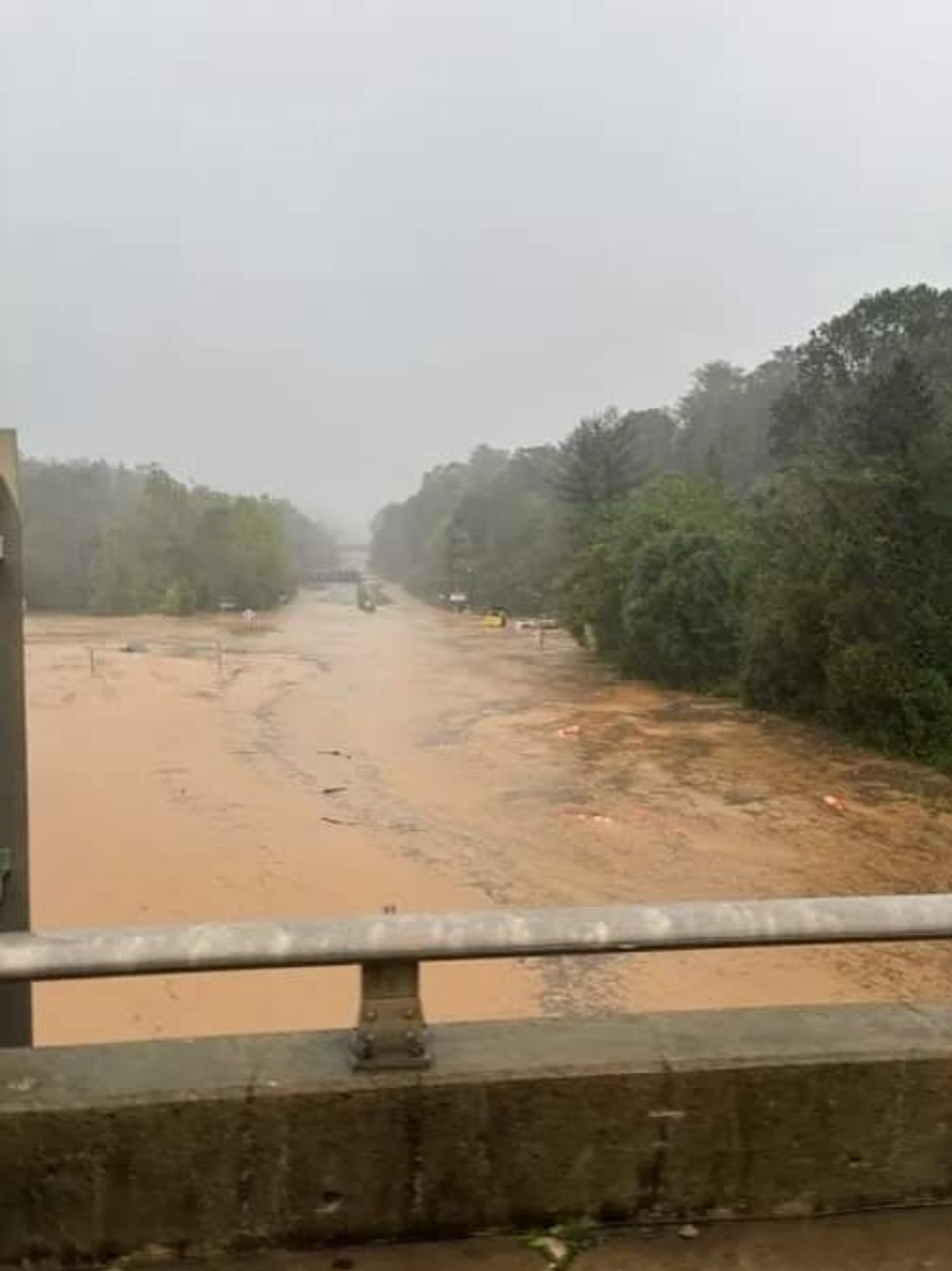 Hwy 74 in Asheville, completed flooded with 5+ feet of water.