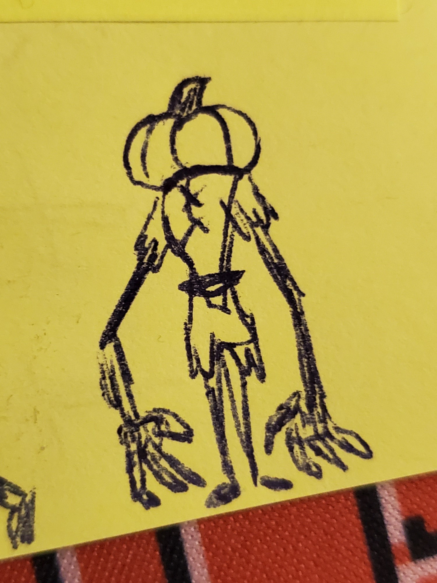 Ink drawing of a lanky figure wearing scarecrow rags with a pumpkin for a head.