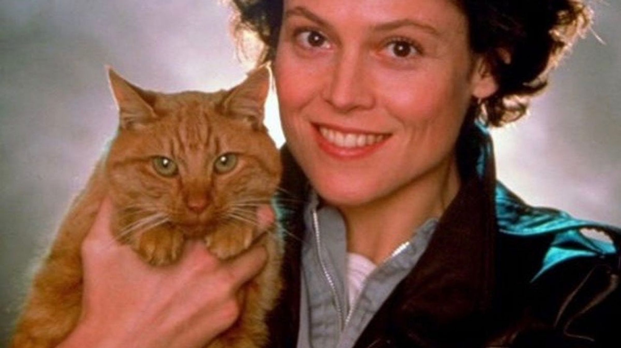 Ripley and her cat, smiling