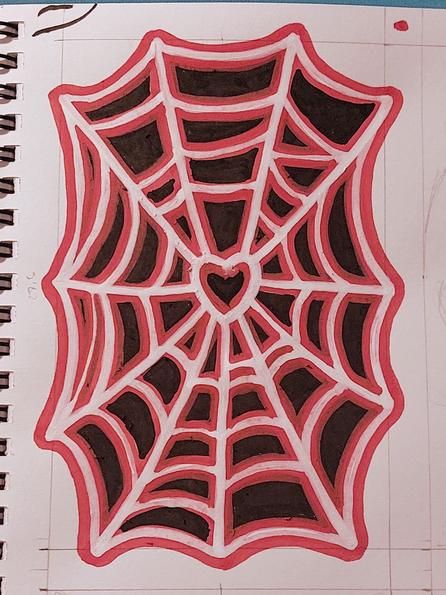 Drawing of a spiderweb with a heart in the middle.