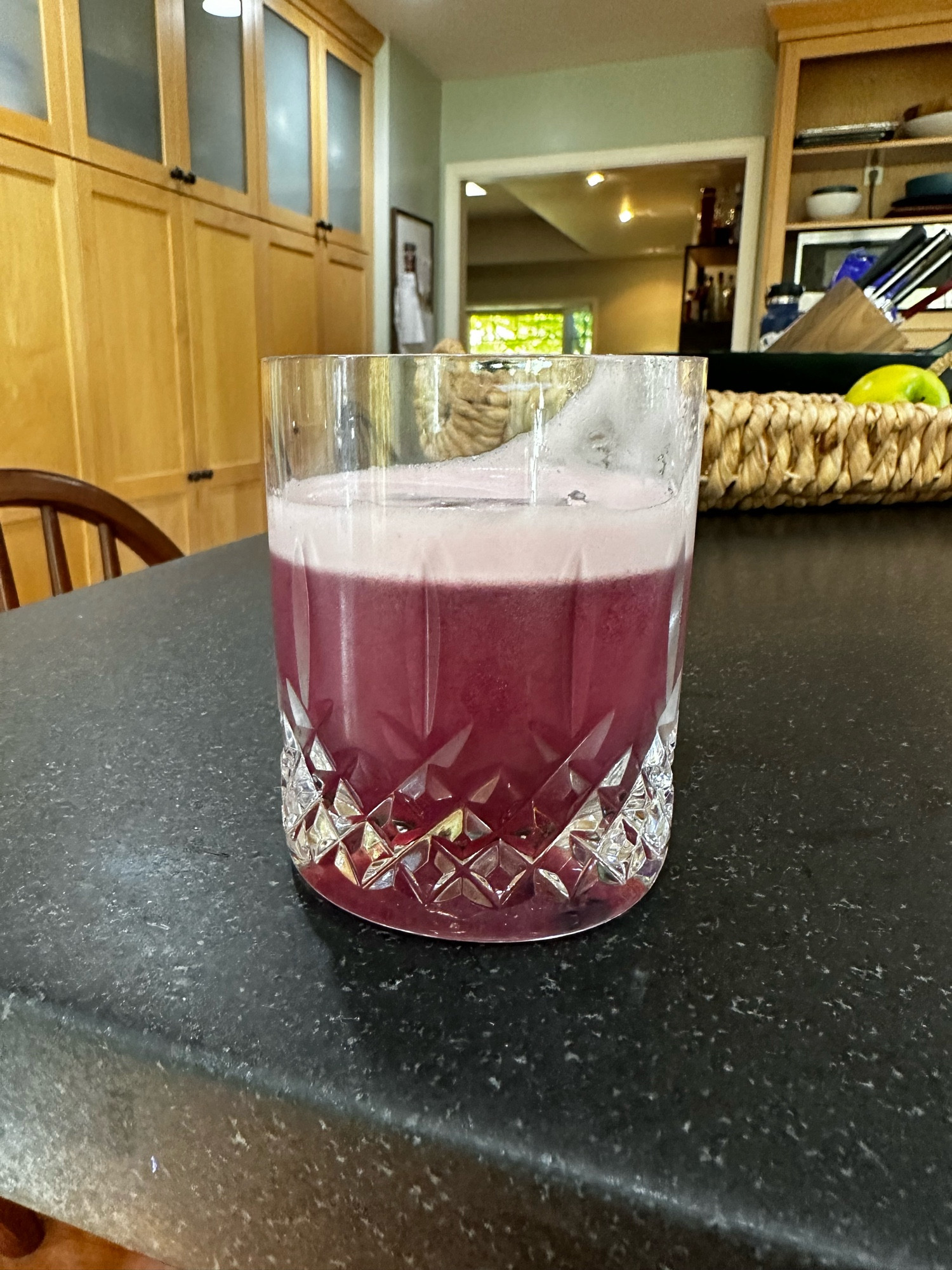 Cocktail glass with purple cocktail