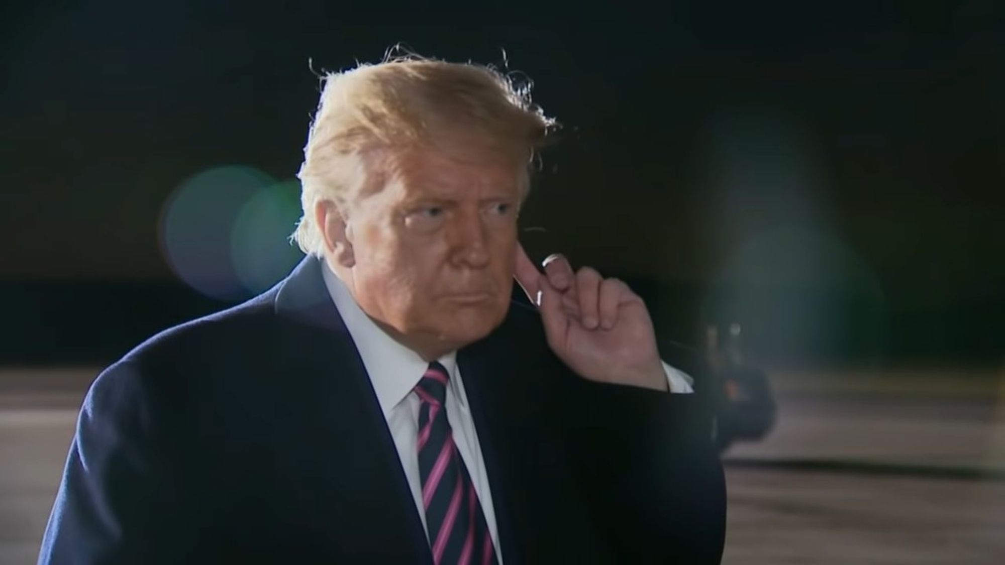 Donald Trump putting a finger to his ear to hear a reporter tell him about the death of RBG. This isn't a video, but Tiny Dancer by Elton John is awkwardly playing in the background of this absurd moment.