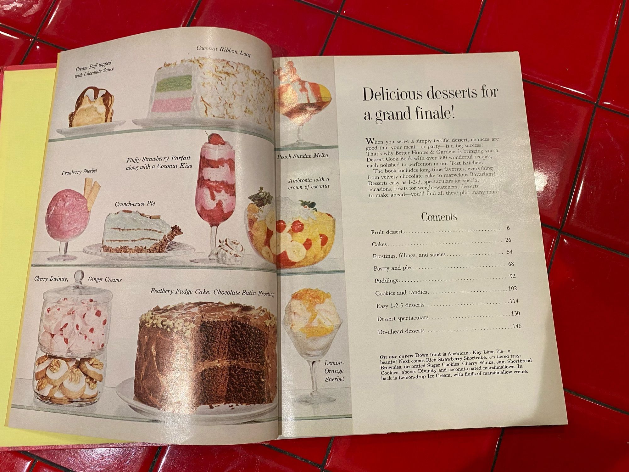 The title page of the Better Homes and Garden Dessert Cook Book.  From top left cream puff topped with chocolate sauce, coconut, ribbed loaf, peach sundae, Melda Melba, cranberry sorbet, crunch crust, pie, fluffy, strawberry, parfait, along with coconut kiss, ambrosia, with a crown of coconut, divinity, ginger, creams, feathery fudge cake, chocolate, satin frosting, lemon, orange sherbet .