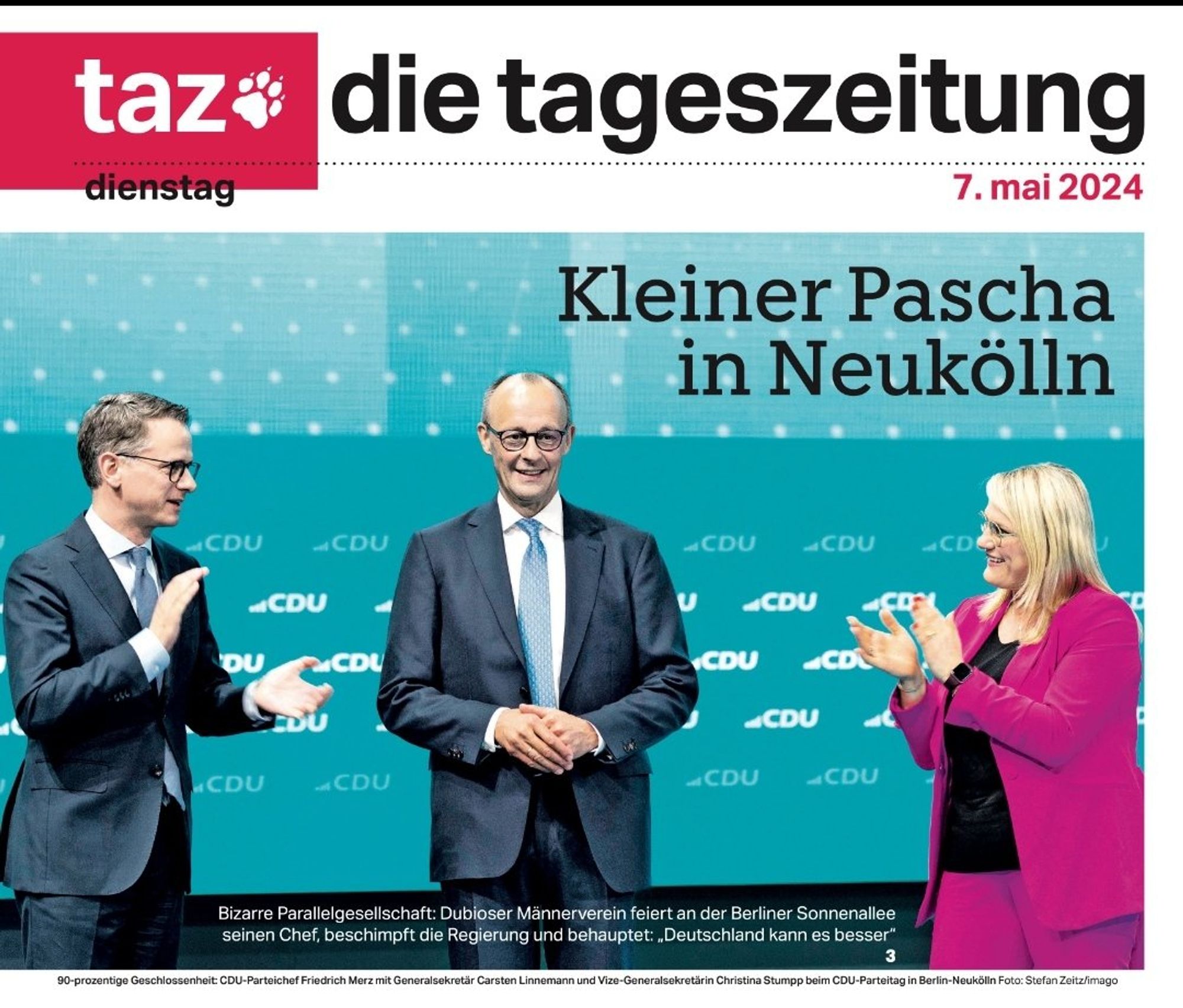 Titelseite taz. Foto des von Untergebenen beklatschten Merz auf dem Parteitag. Dazu die Schlagzeile: Kleiner Pascha in Neukölln