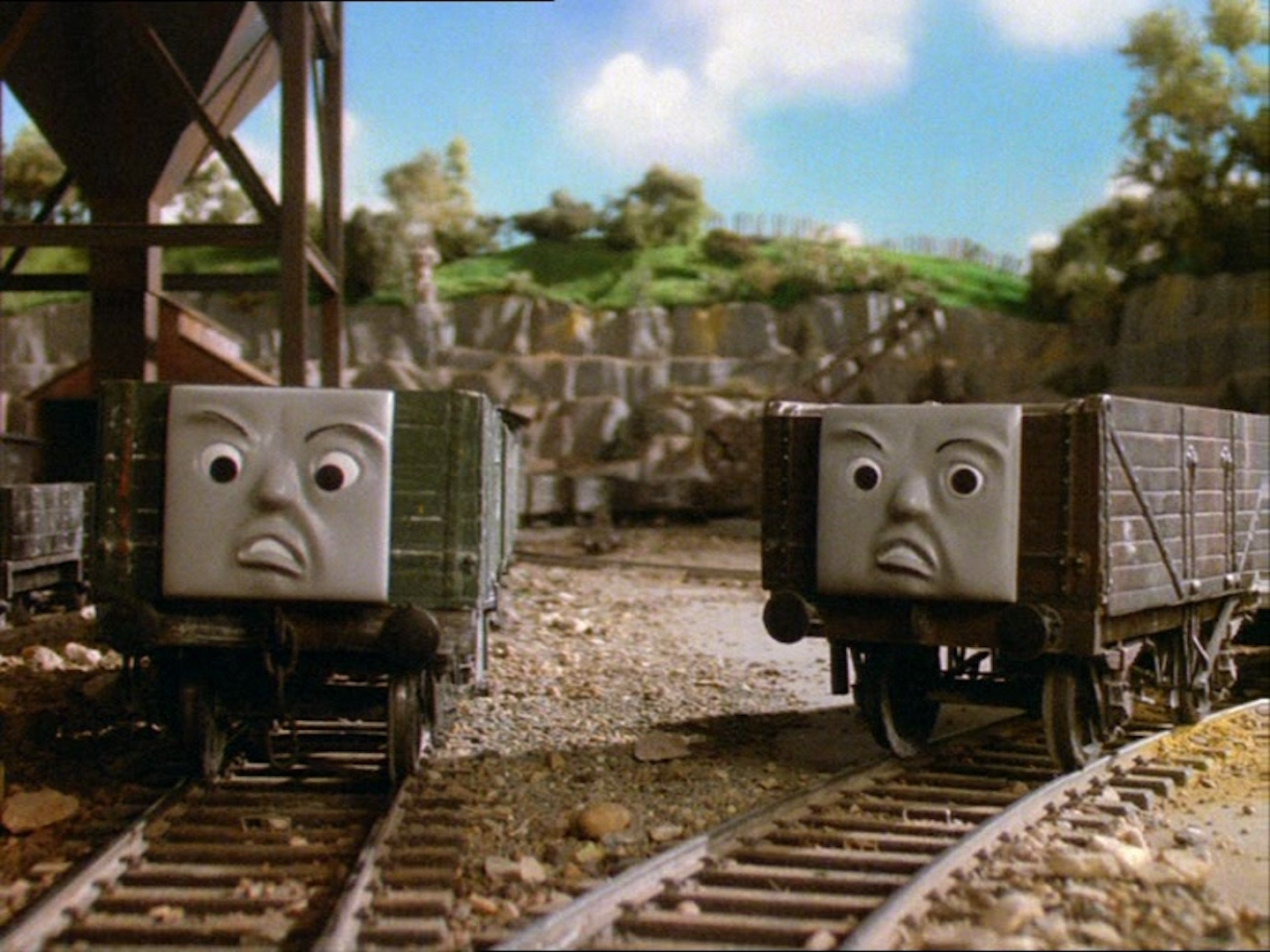 Two troublesome trucks looking disgusted at something 