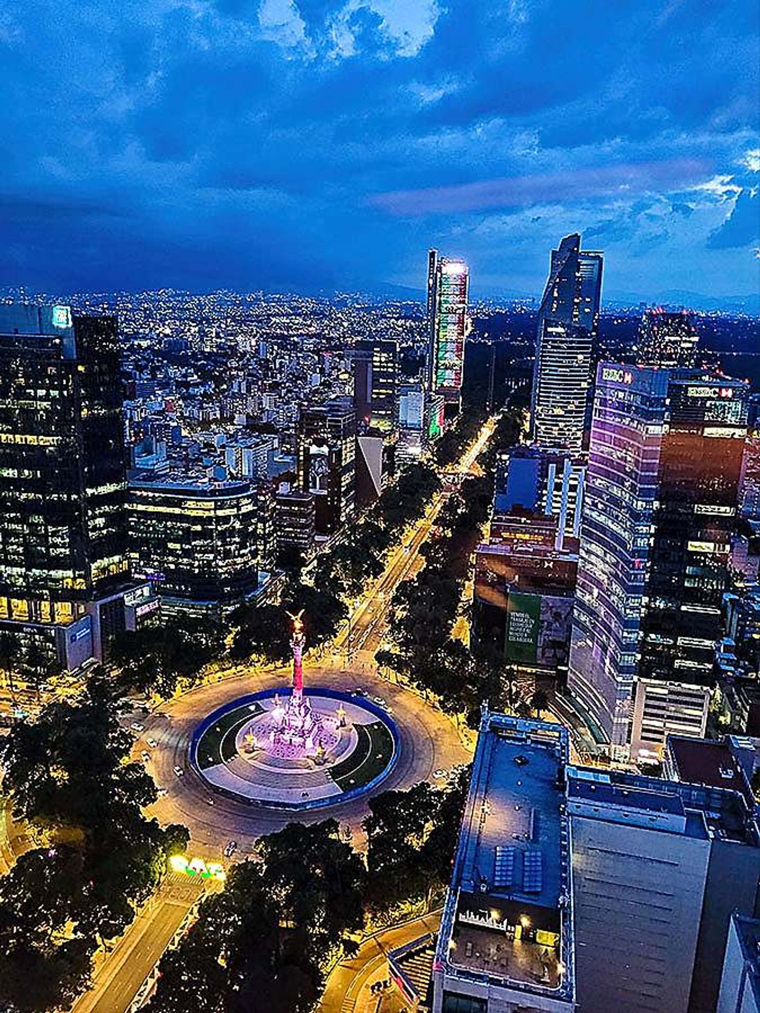 Mexico City as the deep blue, NOT piss-yellow sky gives way to night-time and the city becomes a spectacular vista of light (proving that, yes, we actually do have electricity).