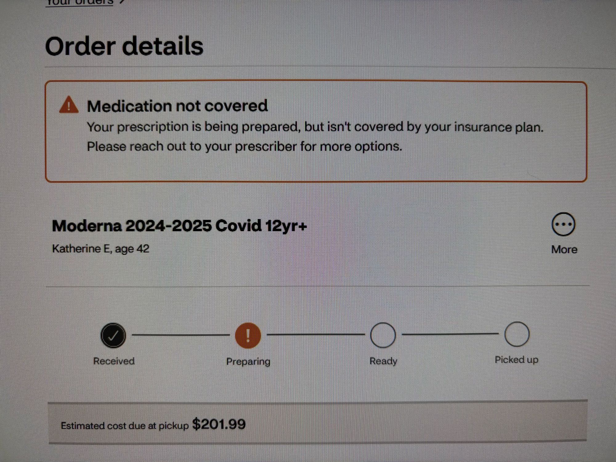 Photo of a computer screen showing “Medication not covered: Your prescription is being prorated, but isn’t covered by your insurance plan,” and a $201.99 cost for Moderna 2024-2025 Covid vaccine at CVS.