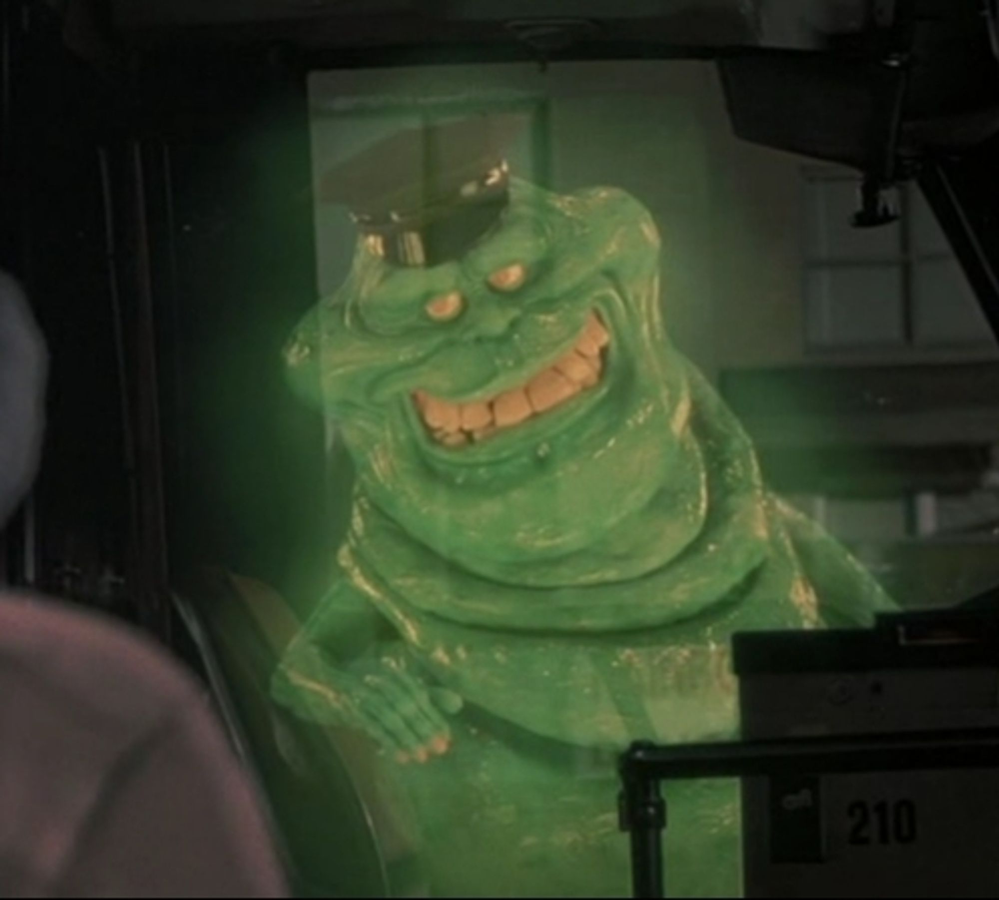 The green slimmer ghost from Ghostbusters, posing as the driver of a ghost bus in New-York.