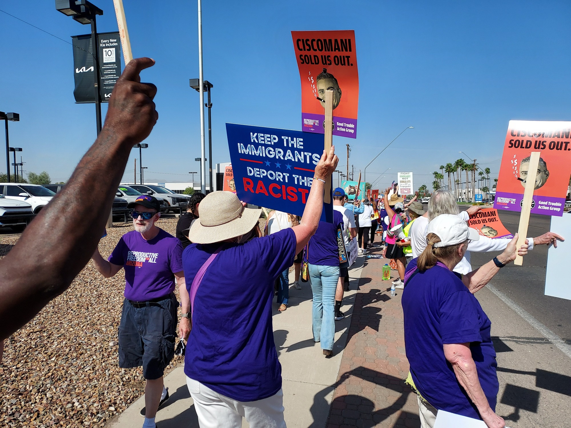 protesters August 23rd, 2025 at auto dealership