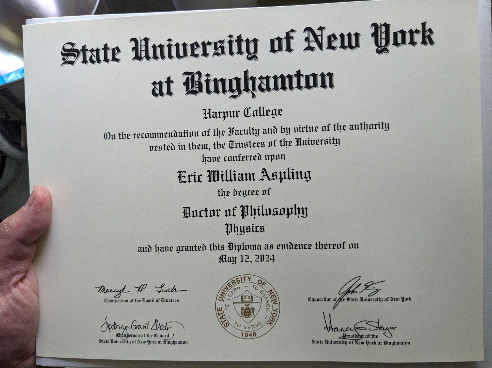 It's a picture of a PhD diploma