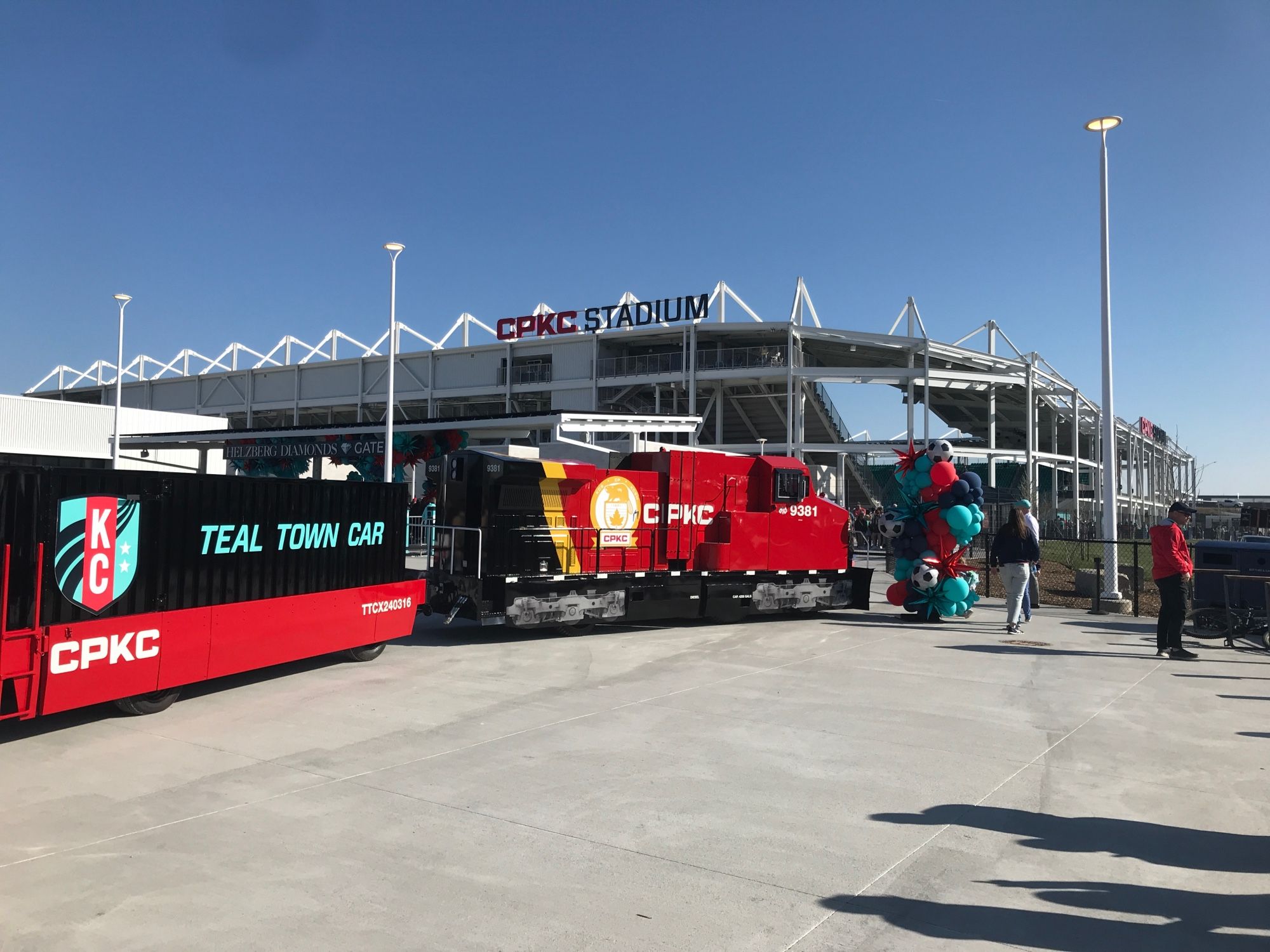 A replica CPKC (Candian Pacific-Kansas City) train sits outside the new CPKC Stadium, home of the NWSL's Kansas City Current soccer team