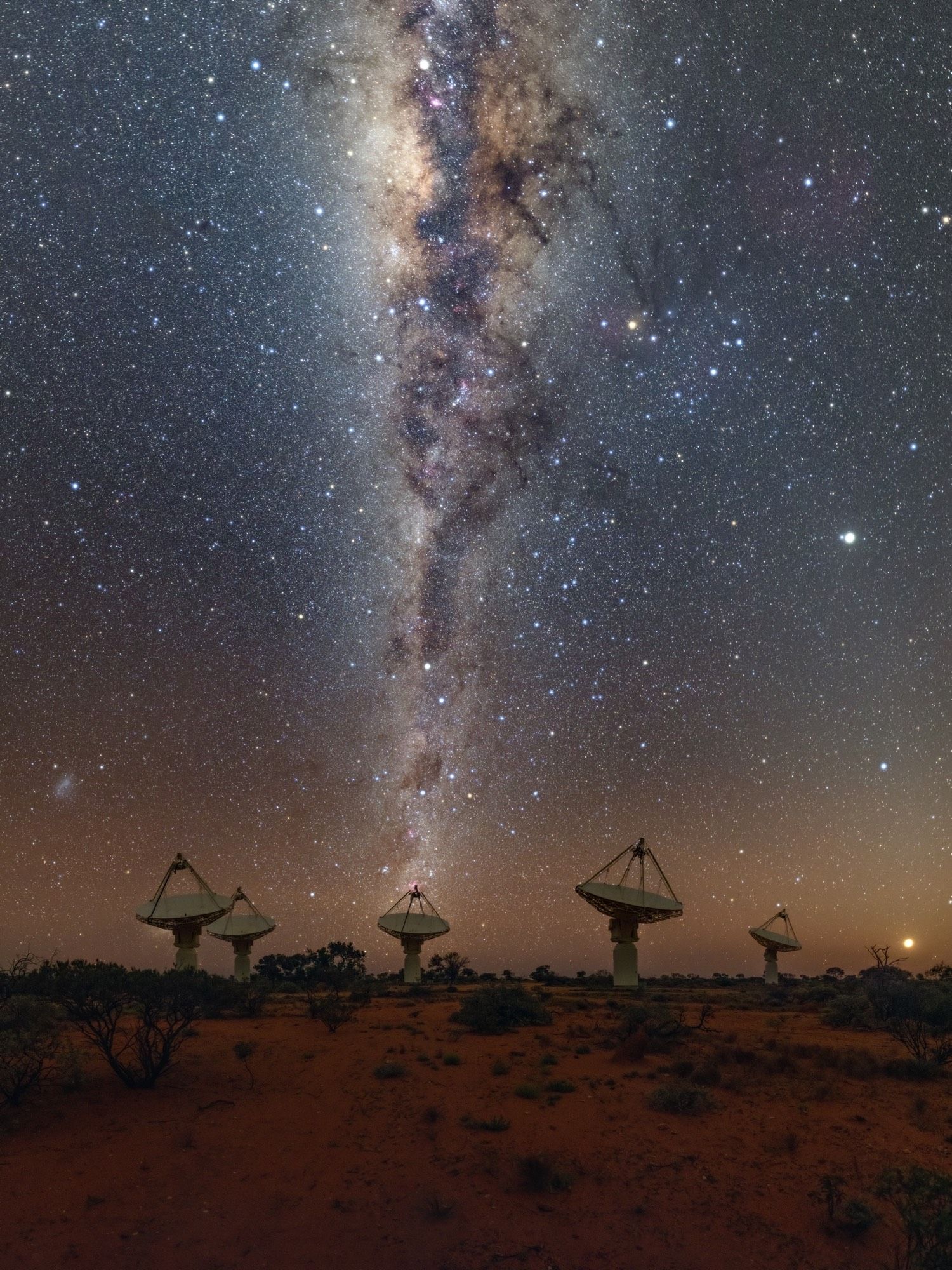 Picture of ASKAP at night, with Milky Way in the background