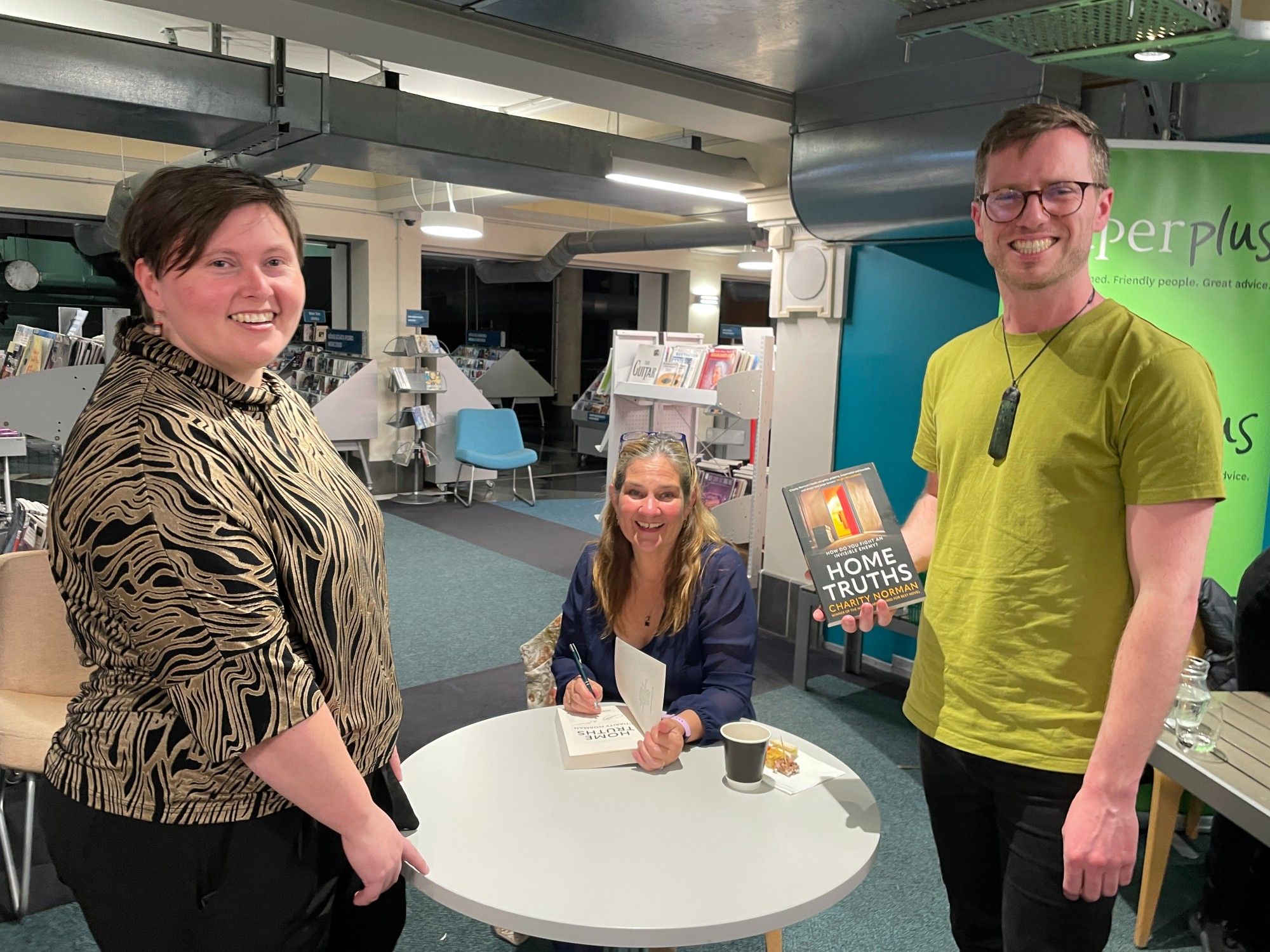 Photo with Charity Norman signing a copy of her latest book, Home Truths.