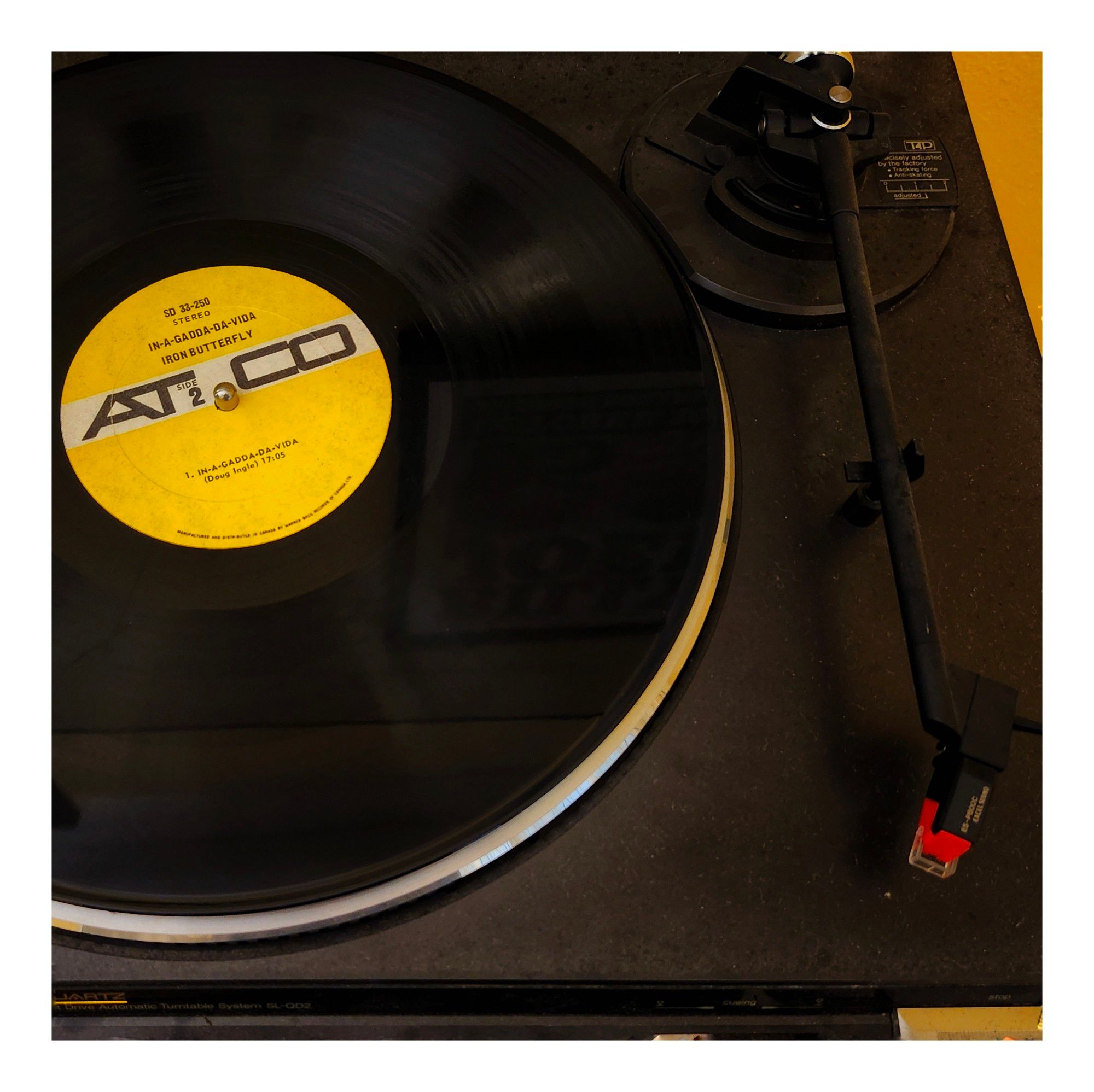 An original pressing of Iron Butterfly's In-A-Gadda-Da-Vida on ATCO records on a Technics turntable