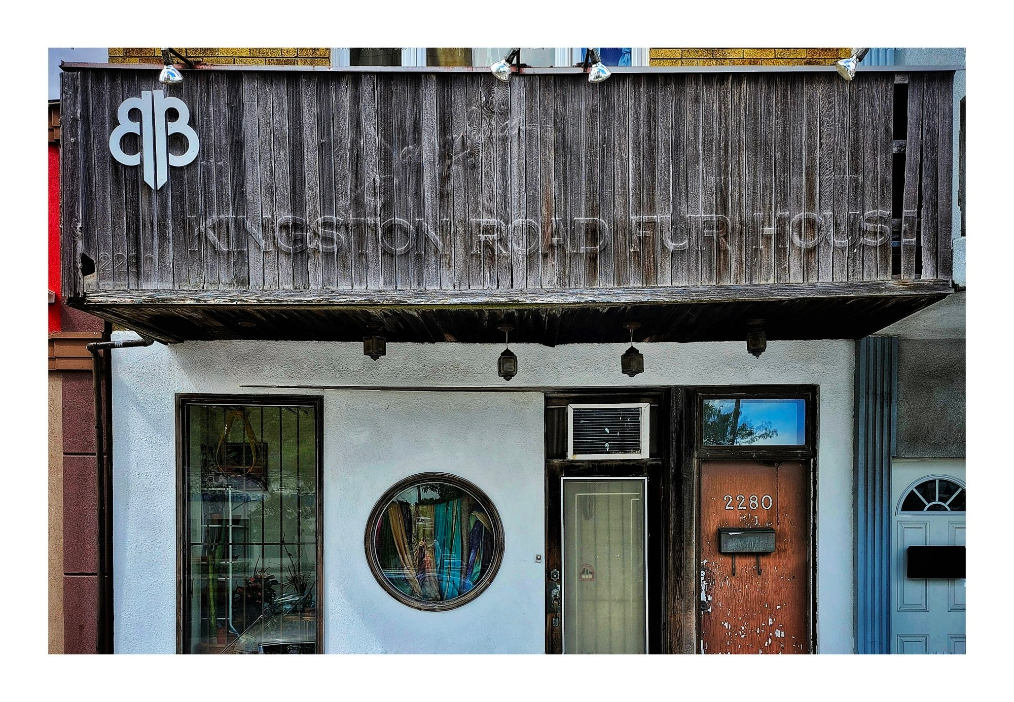 A ghost sign for a former furrier on Kingston Road in Toronto Ontario