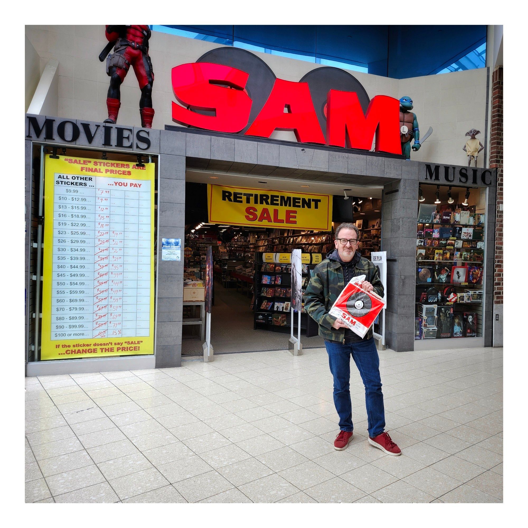 Dork outside Sam The Record Man in Belleville Ontario