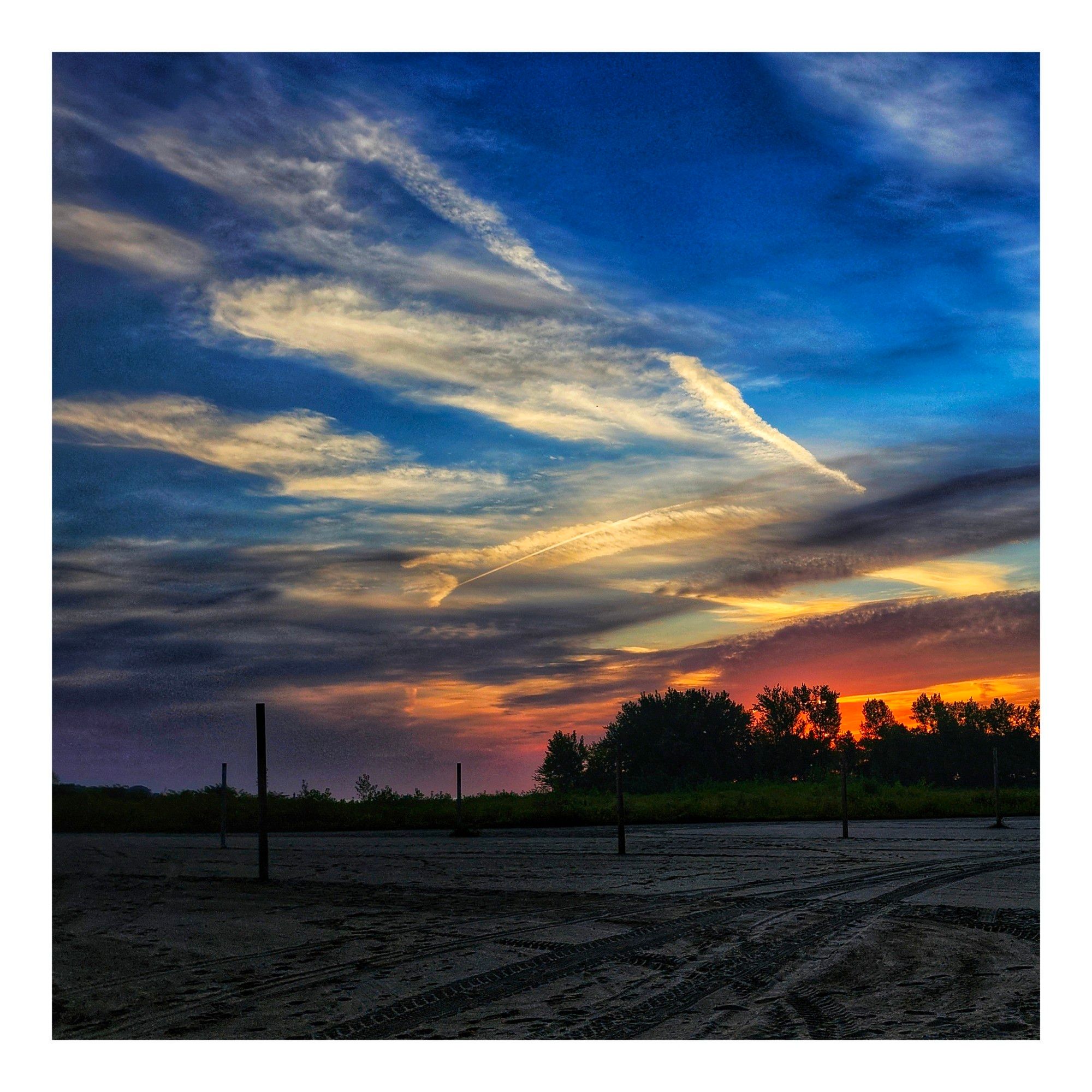 Wispy clouds over Woodbine Beach in Toronto Ontario