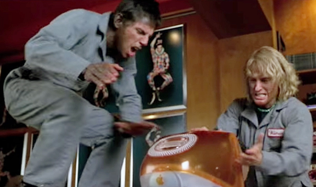 Zoolander bit where two morons attempt to break open an iMac to get the files out