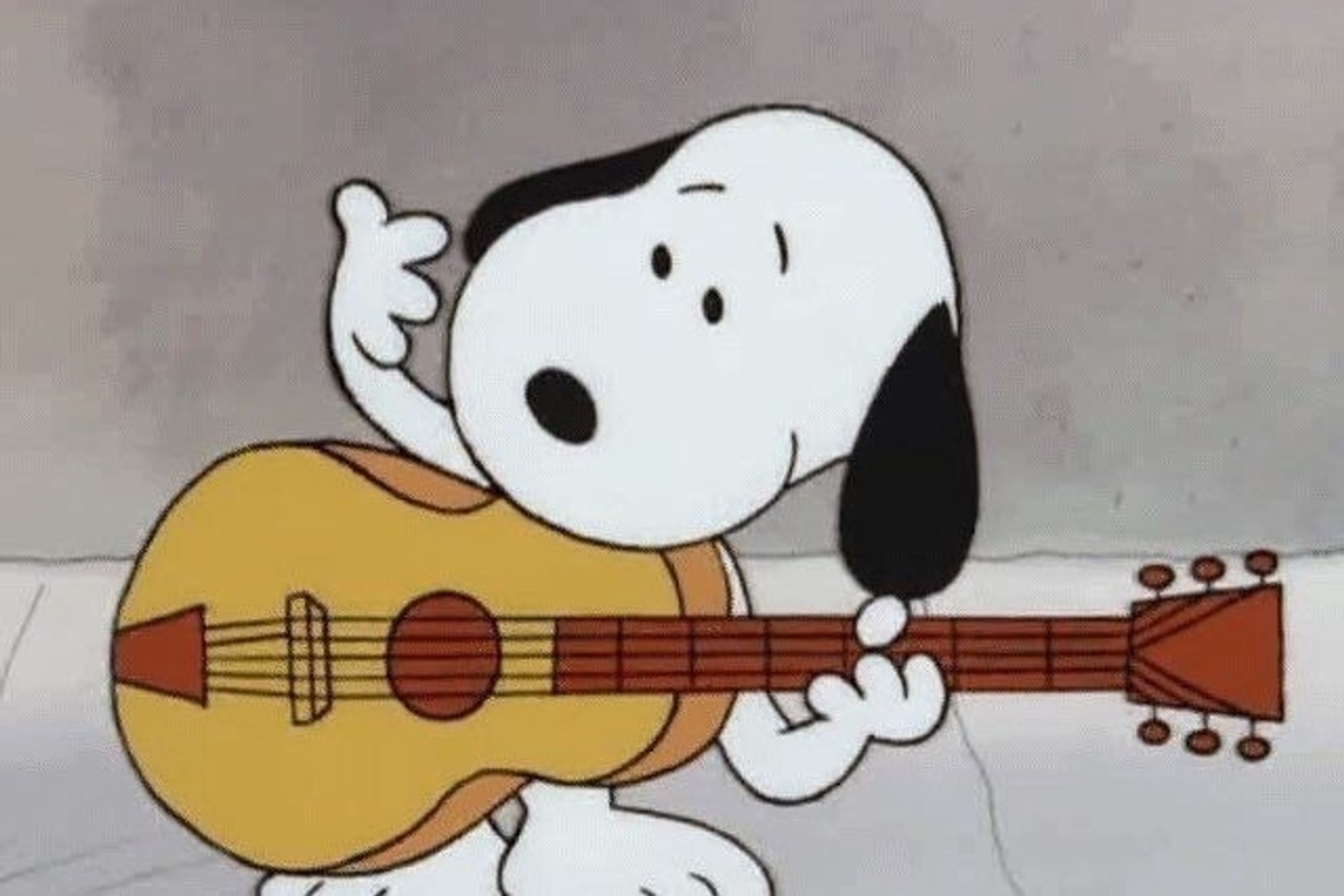 A drawing of Snoopy playing the guitar.