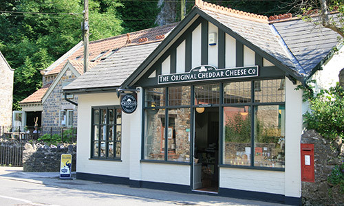 The Original Cheddar Cheese Company building in Cheddar, UK.