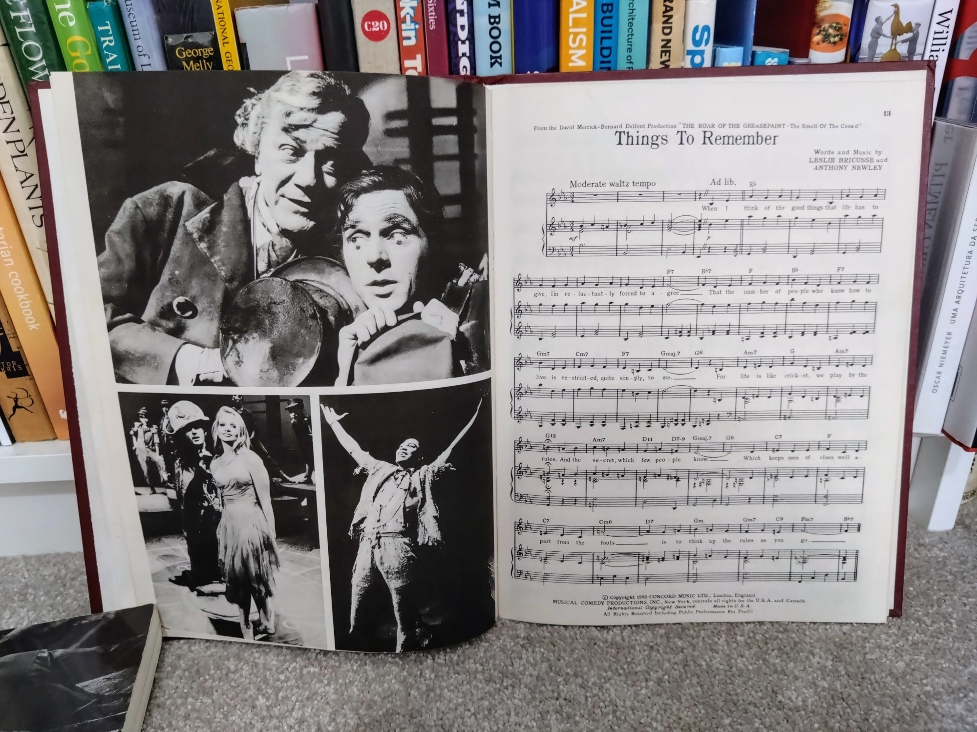 Pages of a song book for The Roar Of The Greasepaint - The Smell Of The Crowd showing pictures and a musical score