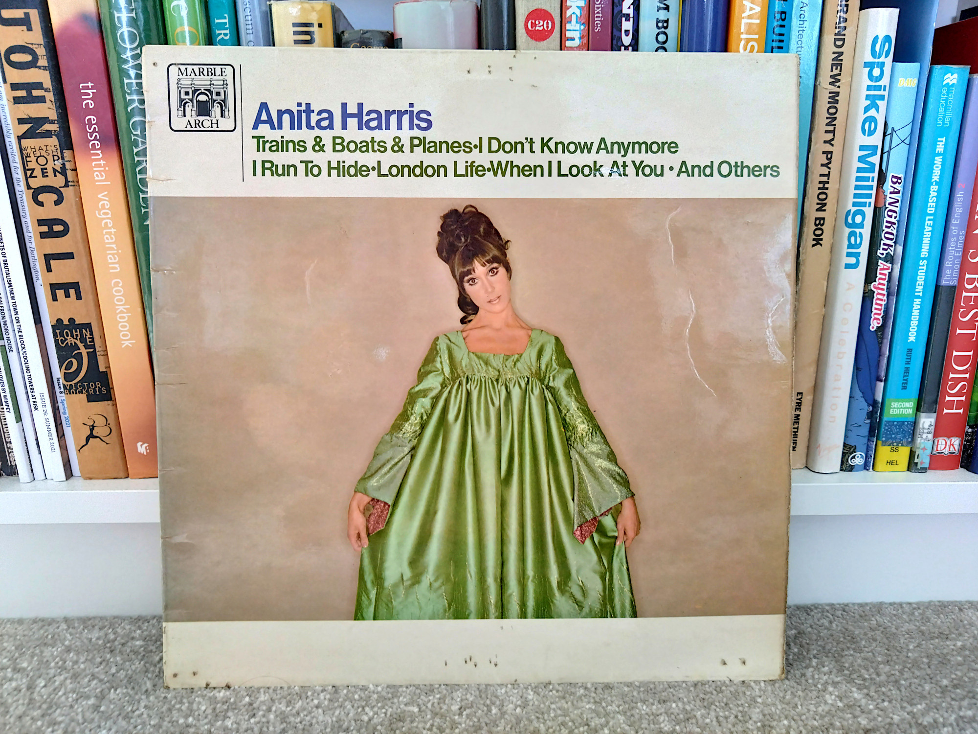 LP record which has a picture of Anita Harris on the sleeve. She is wearing a green dress.