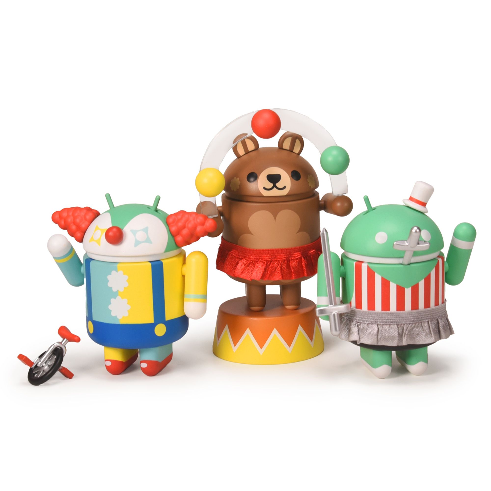 Photo of Circus Friends Android toy collectible Clown, Juggling Bear and Sword Swallower on white background.