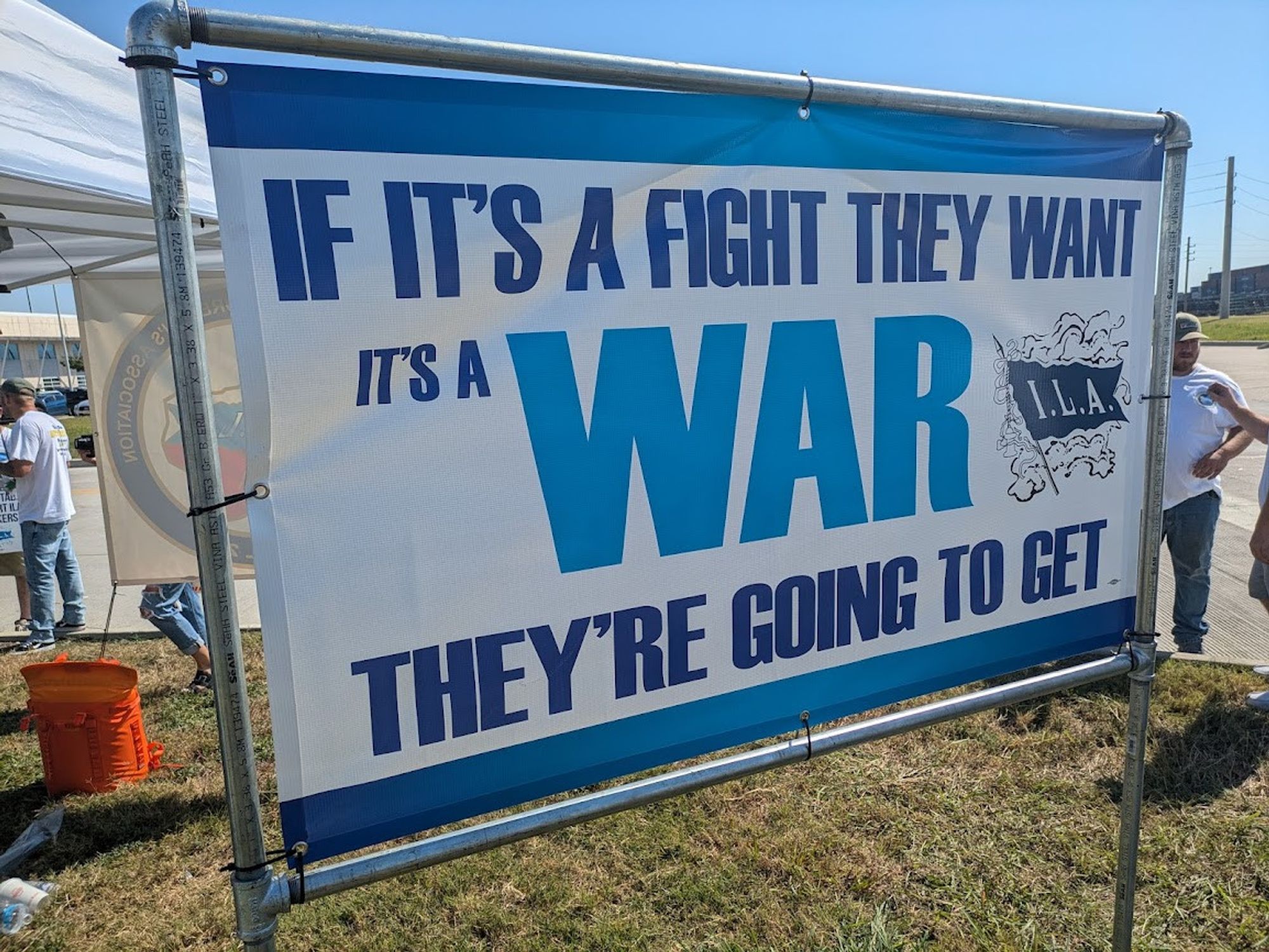 ILA sign reading "if it's a fight they want it's a war they're going to get"